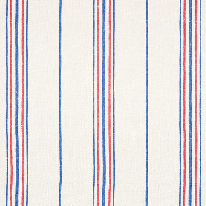 Scarset Stripe fabric in blue and red color - pattern number 75261 - by Schumacher in the Chambray collection