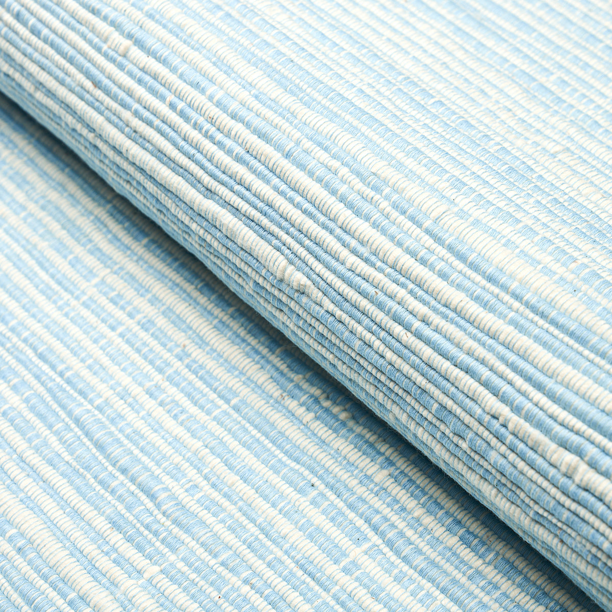 Zeta Handwoven Texture fabric in sky color - pattern number 81372 - by Schumacher in the Onora collection