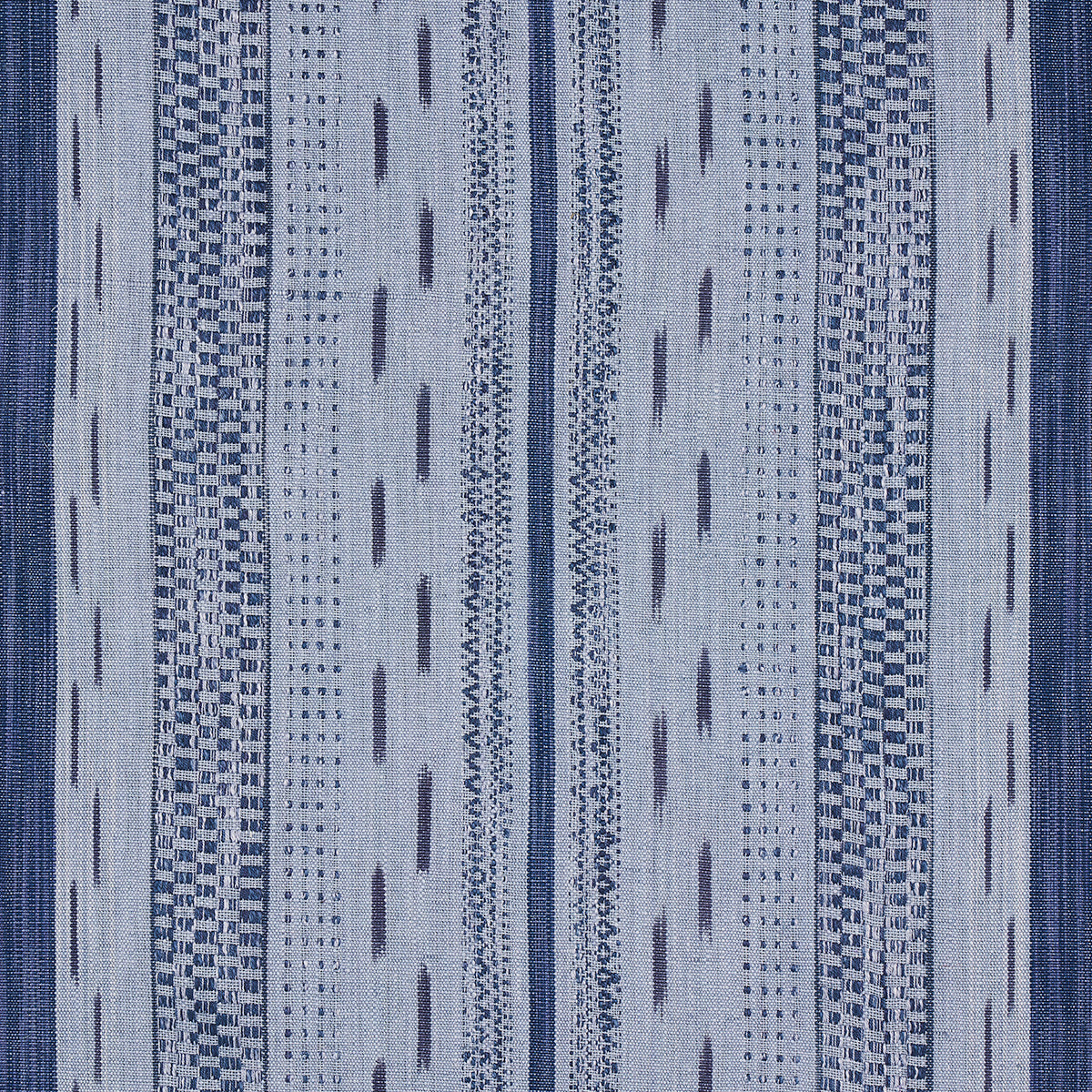 Mirza Ikat Stripe fabric in indigo on chambray color - pattern number 82112 - by Schumacher in the Bohemia collection