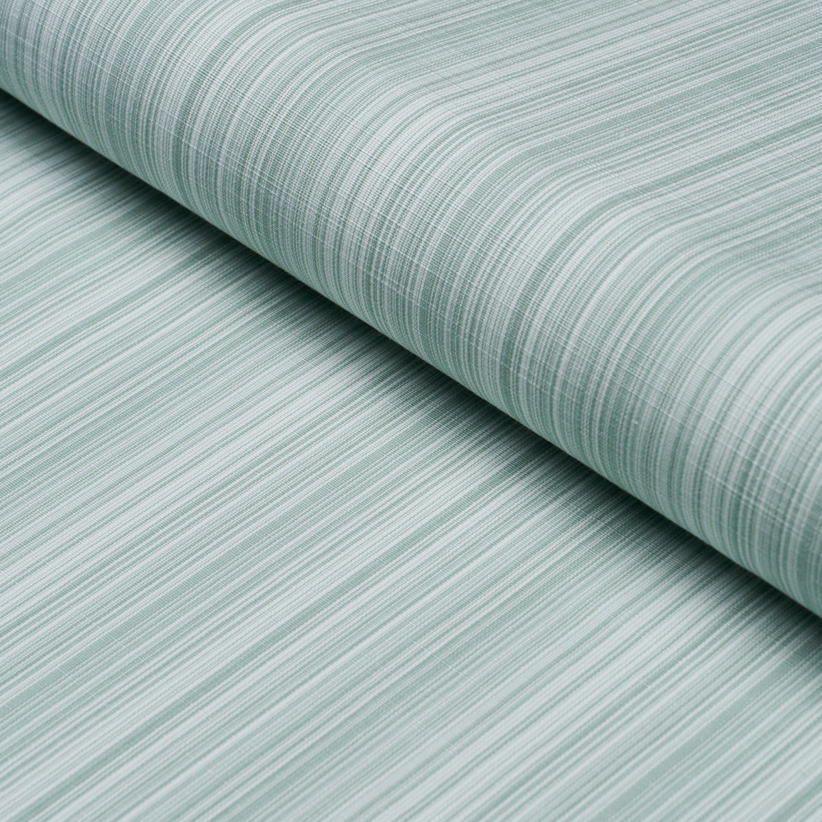 Gracie Solid Strié fabric in mint green color - pattern number 85931 - by Schumacher in the Mark D. Sikes collection