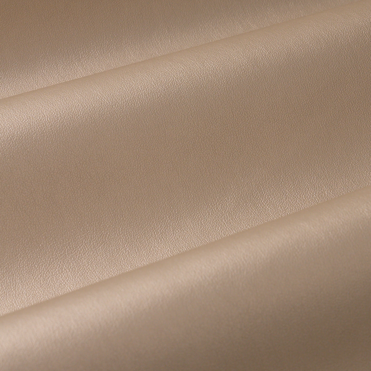 Metallic Vegan Leather Outdoor fabric in dune color - pattern number 86991 - by Schumacher in the Atelier Paris collection