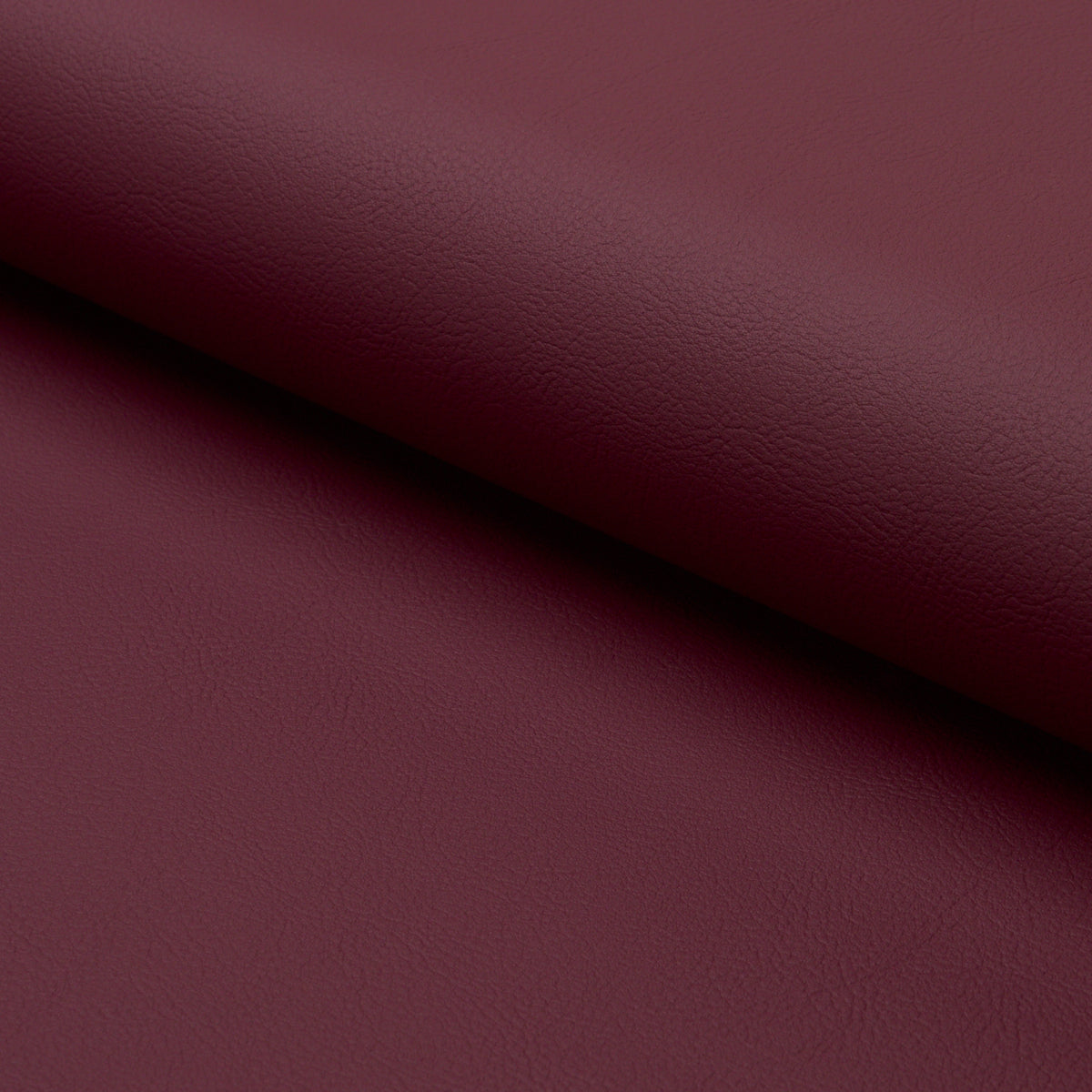 Vegan Leather Indoor/Outdoor fabric in merlot color - pattern number 87052 - by Schumacher in the Perfect Basics: Vegan Leather & Suede collection