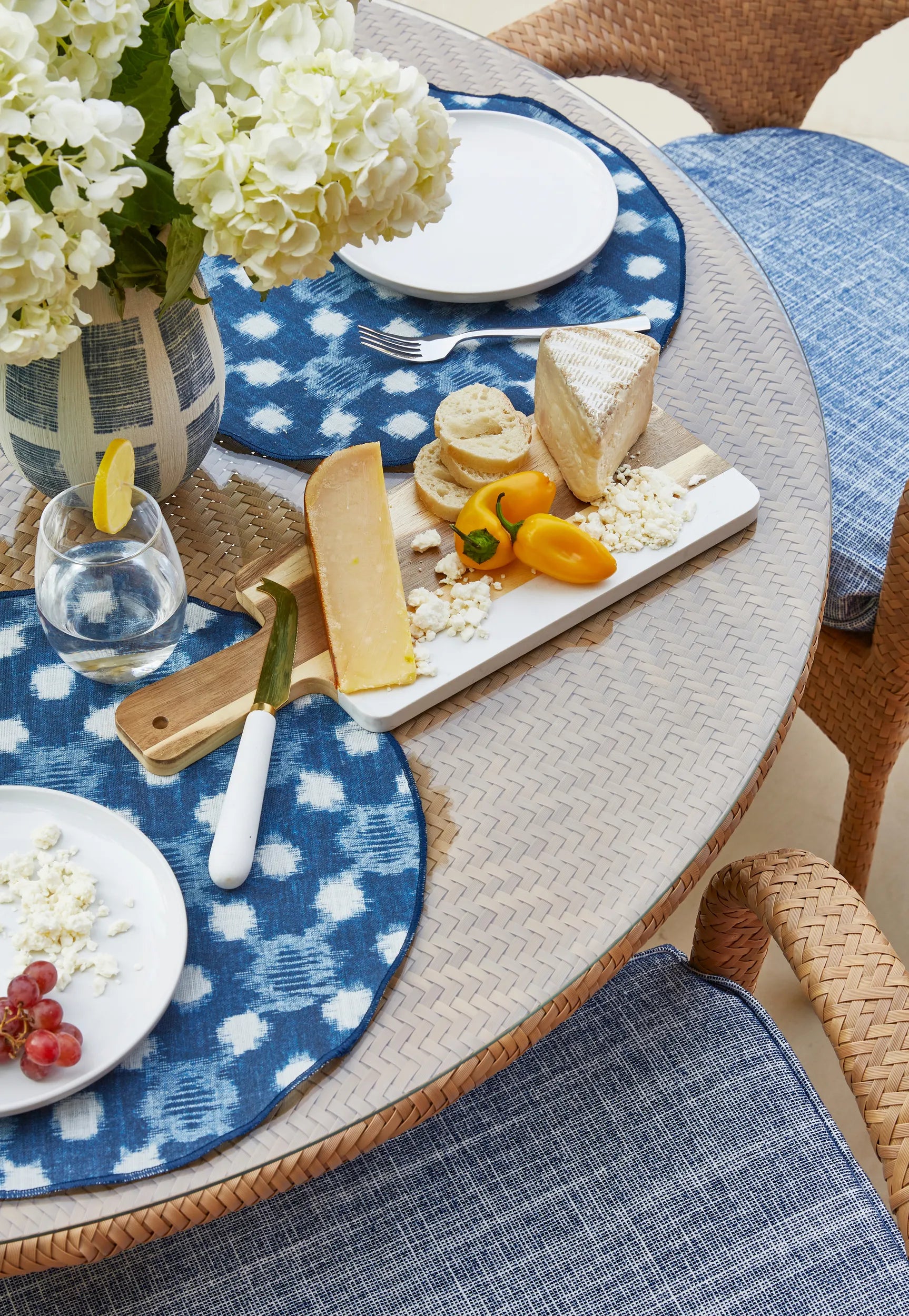 Table place settings made from Kravet Couture Anjuna fabric in marine color - pattern ANJUNA.51.0