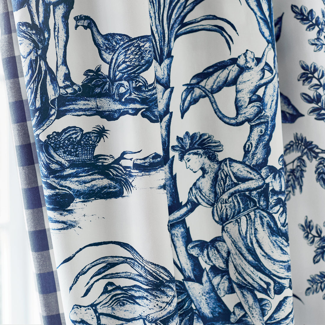 Detail of drapery in Antilles Toile printed fabric in Navy - pattern number AF15171 - by Anna French in the Antilles collection