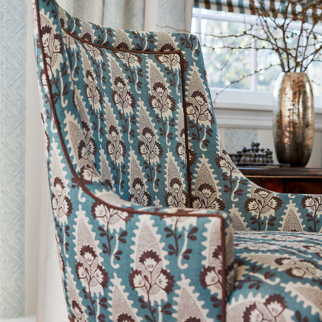 Detail of Palisades Dining Chairs in Cornwall printed fabric in Brown and Slate - pattern number AF15122 - by Anna French in the Antilles collection