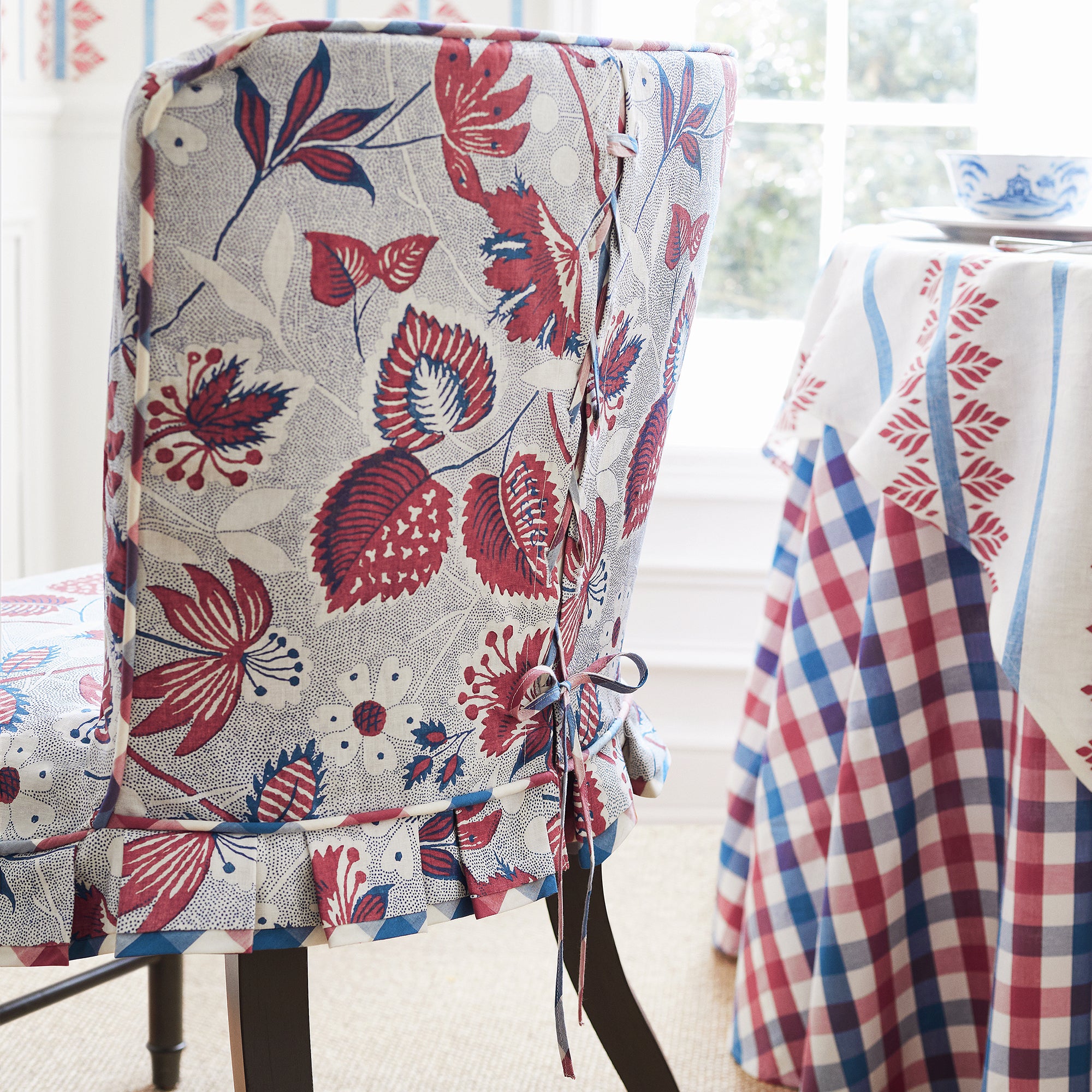 Stirling Dining Chair slipcover in Indienne Hazel printed fabric in Red and Blue - pattern number AF15115 - by Anna French in the Antilles collection