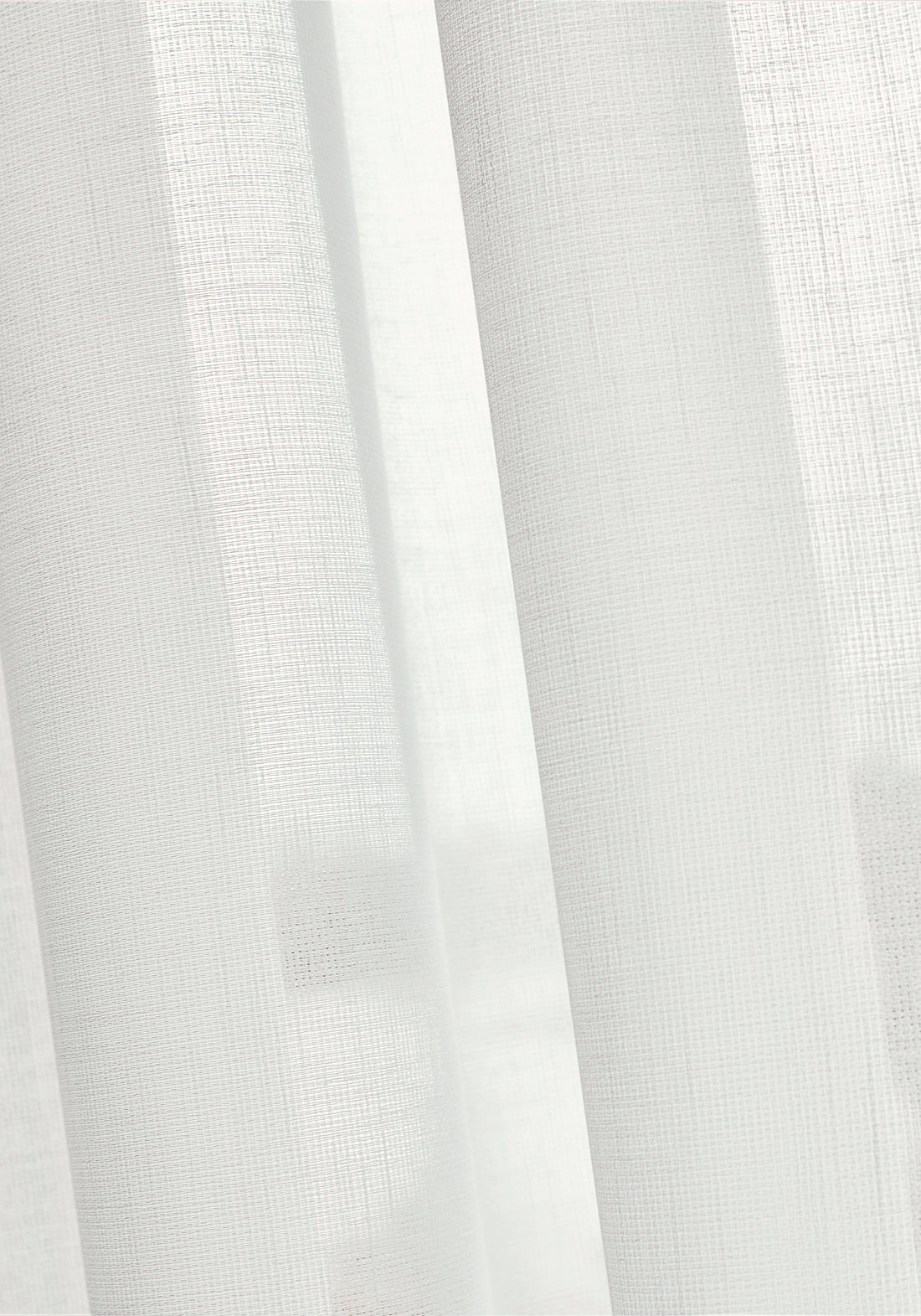 Sheer drapery curtains made with Thibaut Abbot woven fabric in Snow White color, pattern FWW7144