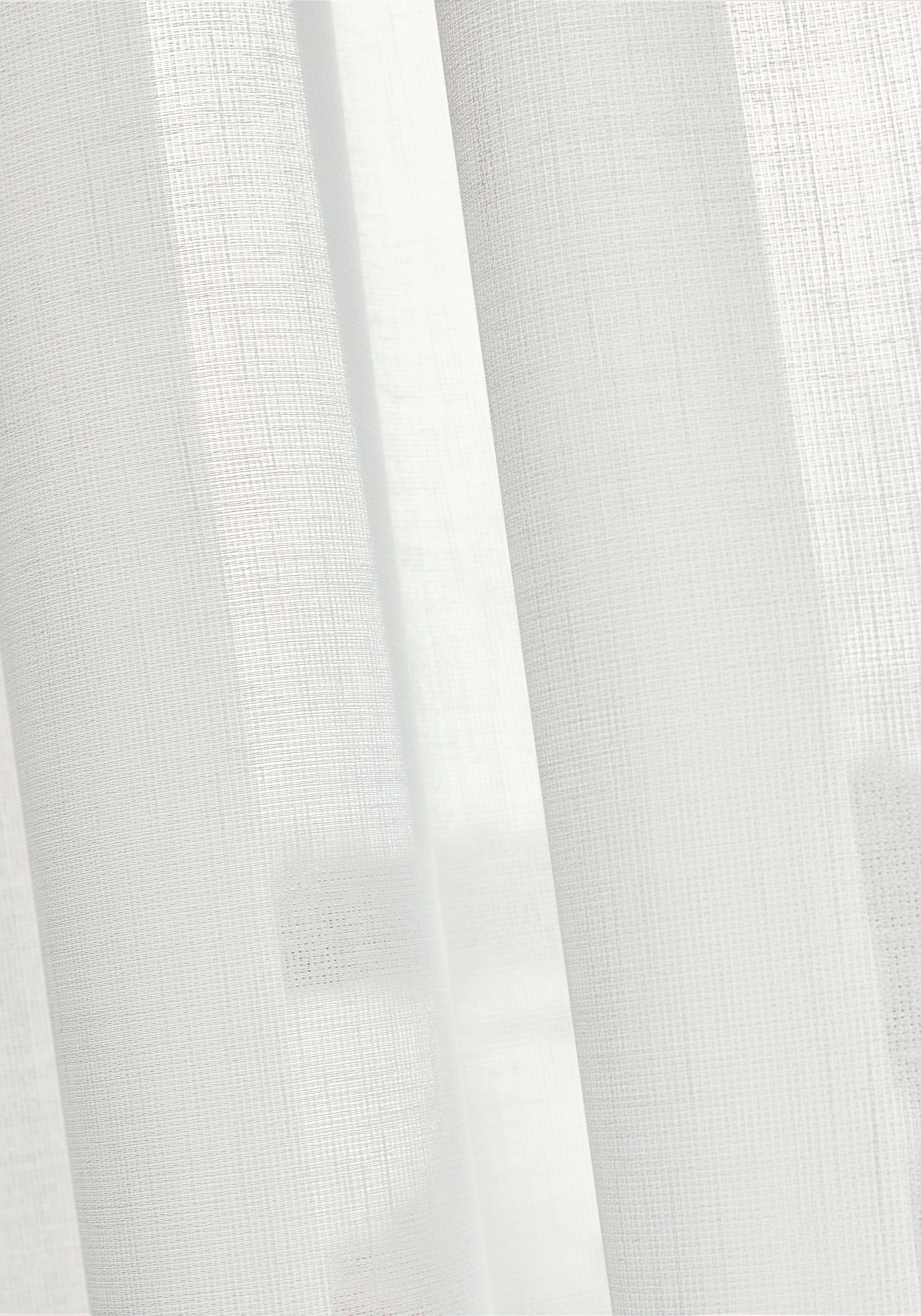 Sheer drapery curtains made with Thibaut Abbot woven fabric in Snow White color, pattern FWW7144