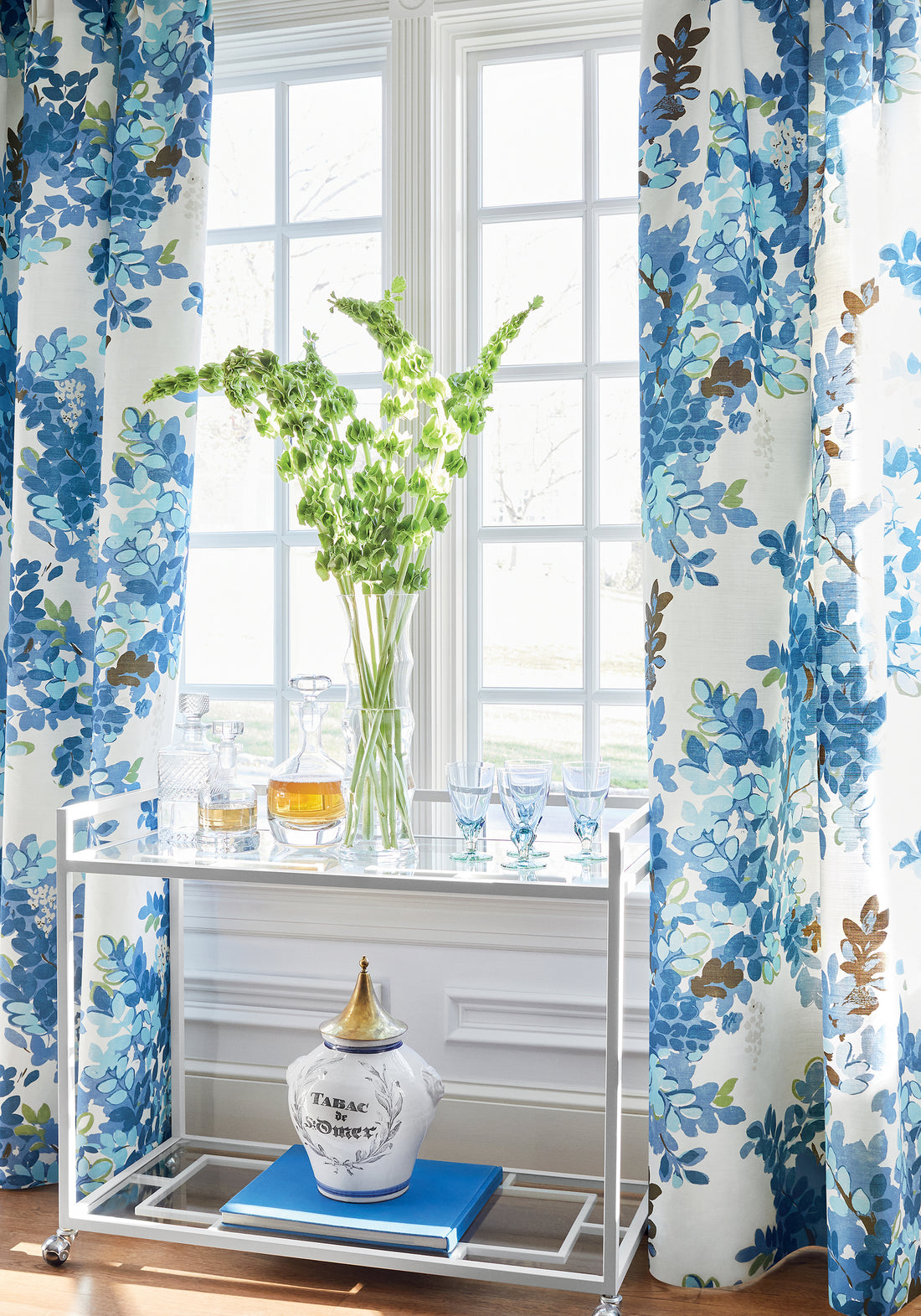 Drapery curtains made with Thibaut Central Park fabric in blue and green color - pattern F914330