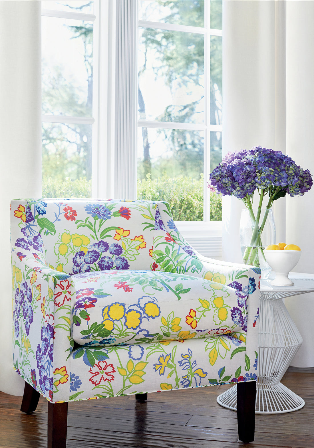 Everett Chair upholstered in Thibaut Spring Garden printed fabric in Brights color pattern F914341
