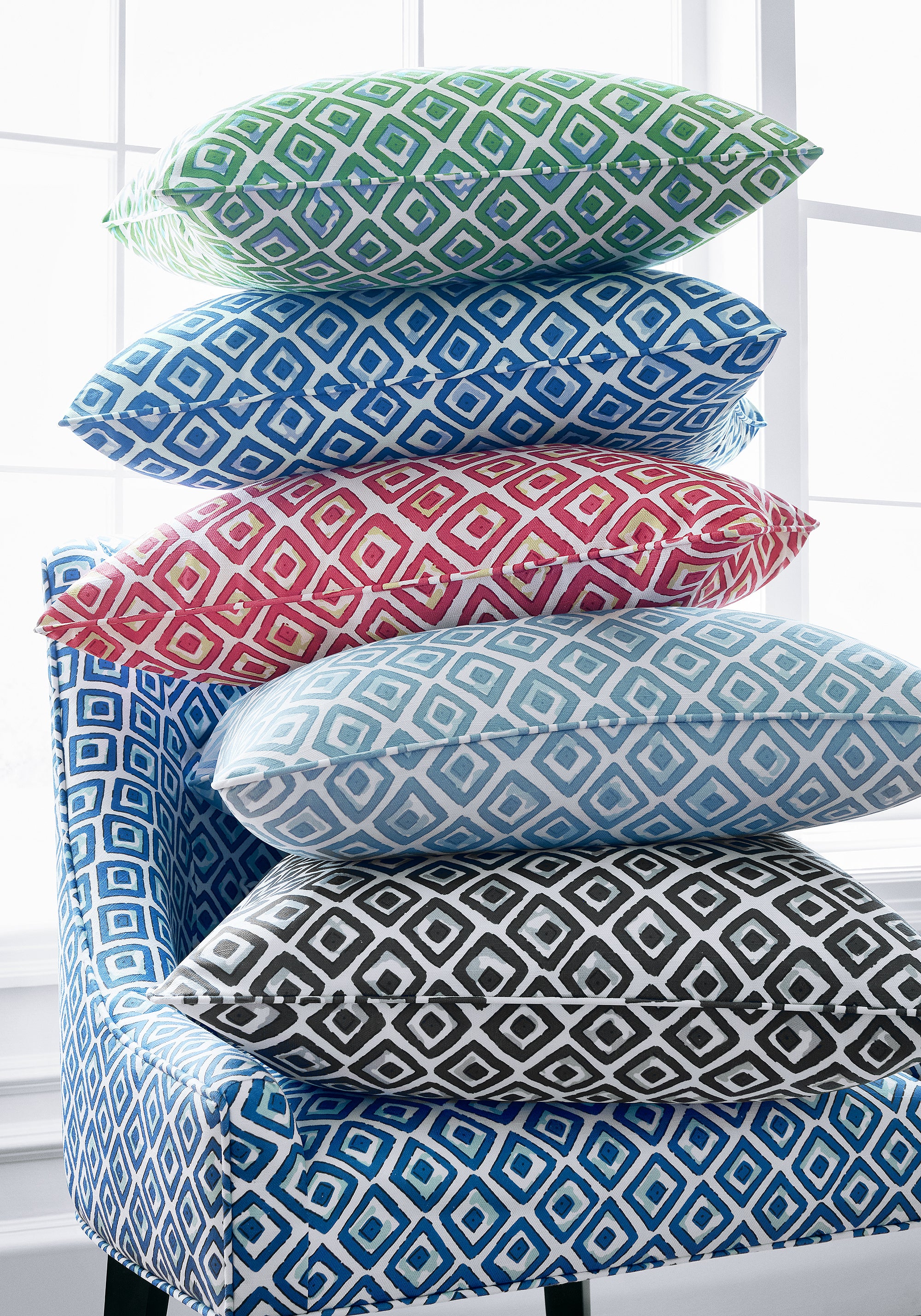 Pillow made with Thibaut Indian Diamond printed fabric in pink color - pattern F910663