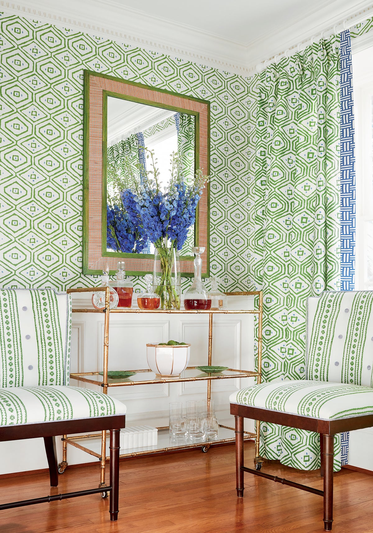 Living room with drapery curtains made with Thibaut Pass-A-Grille fabric in green color - pattern F910616