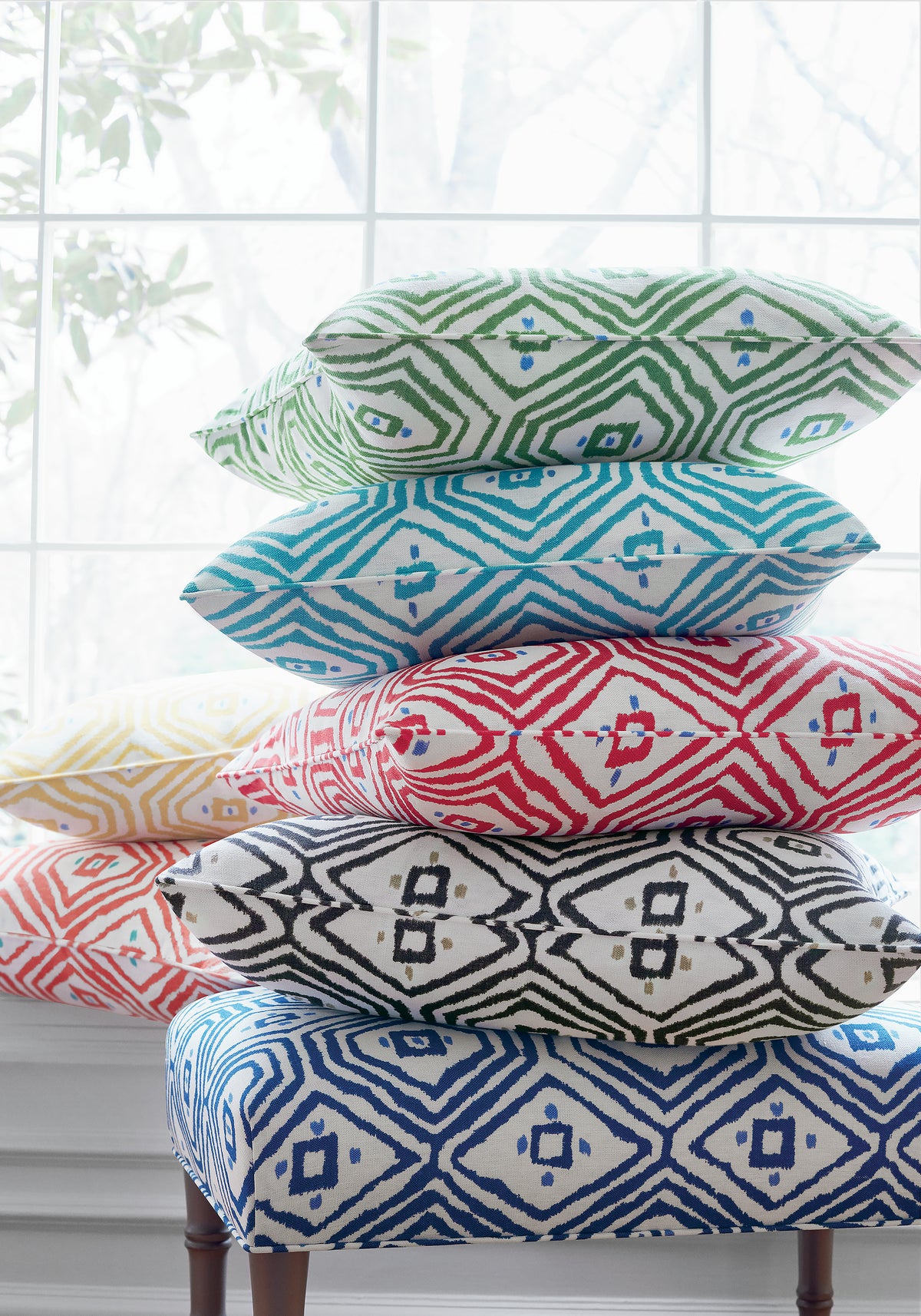 Pillow made with Thibaut Pass-A-Grille fabric in green color - pattern F910616