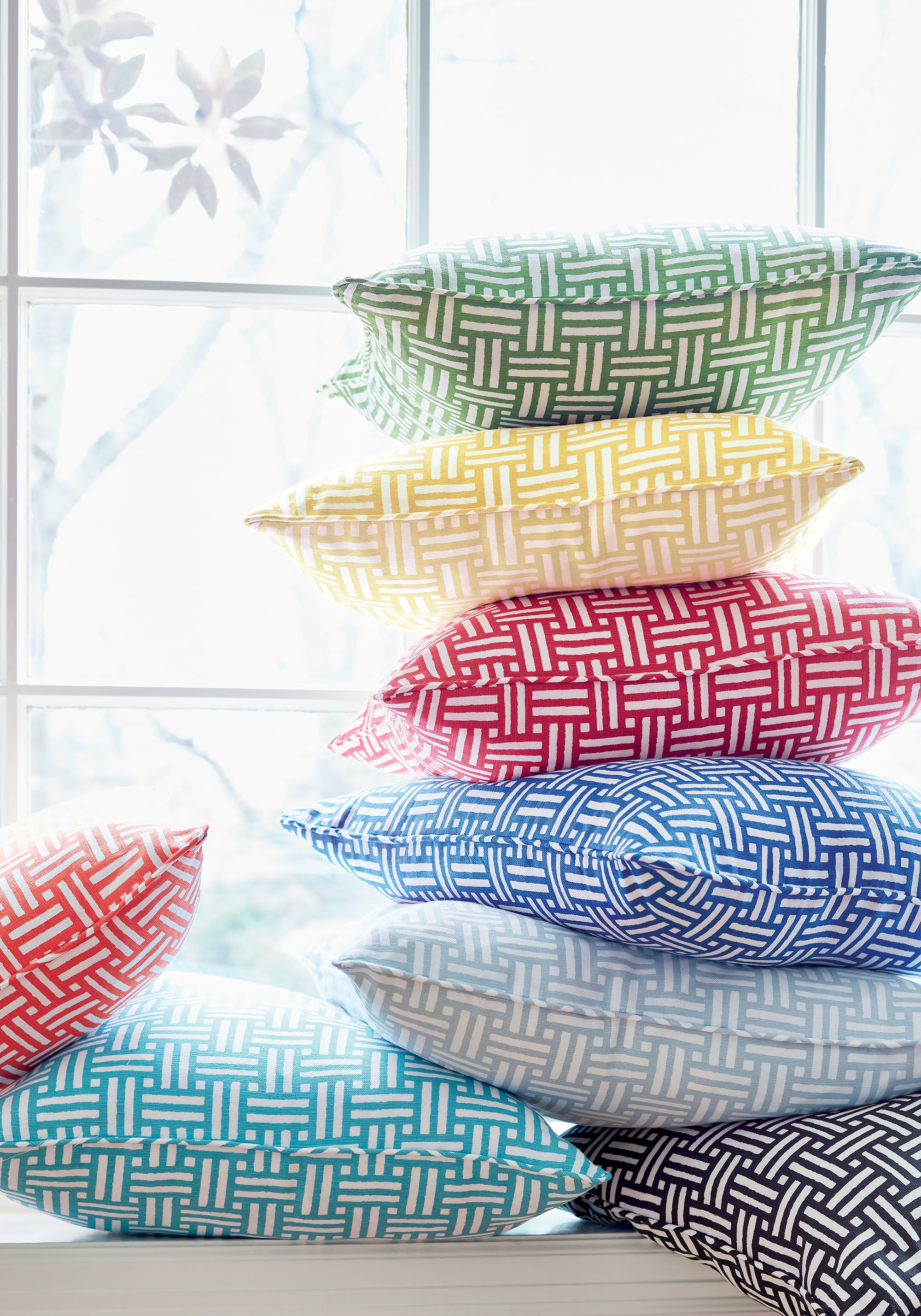 Pillow made with Piermont fabric in coral color - pattern number F910627