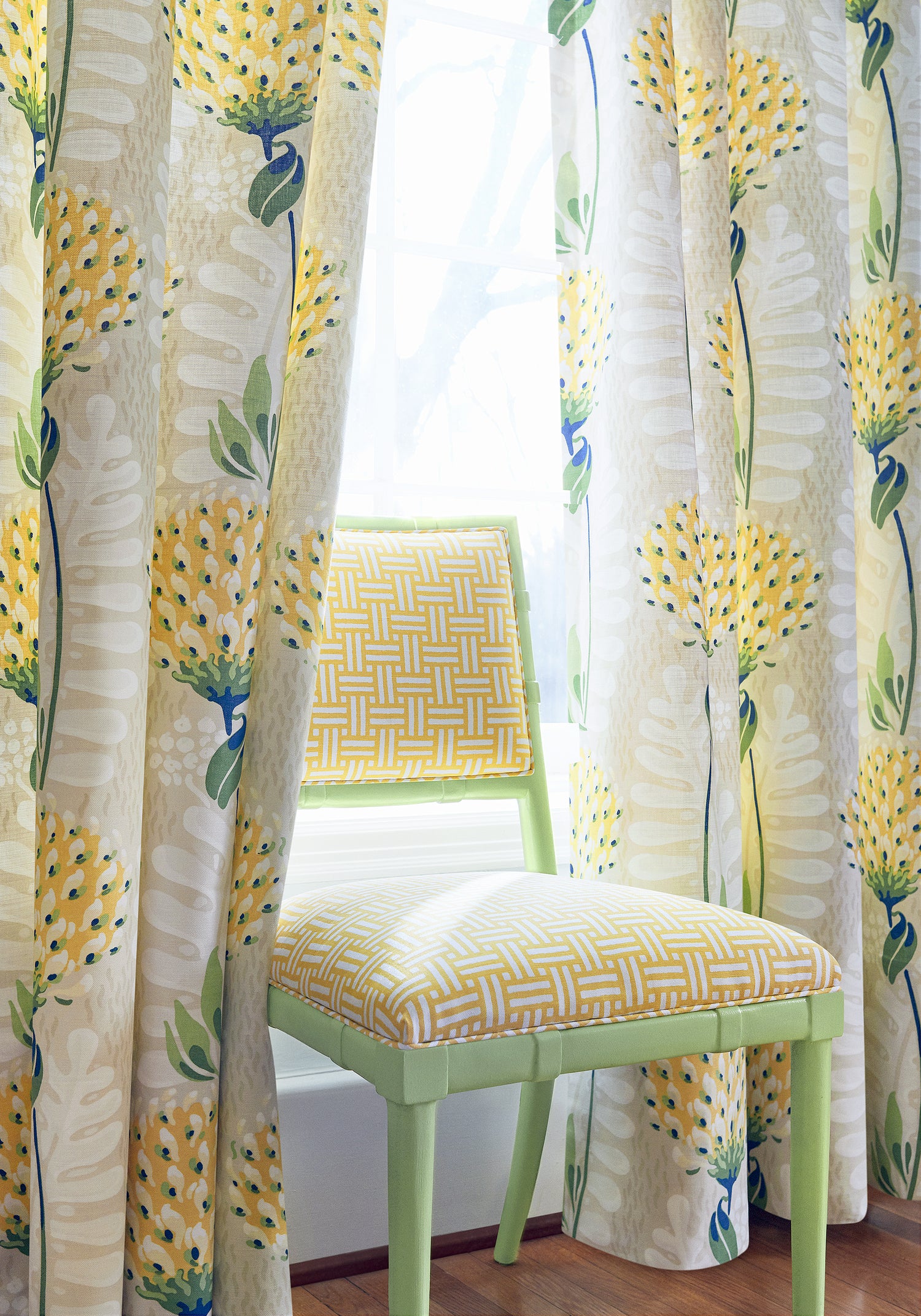 Living room with Drapery curtains made with Thibaut Tiverton fabric in yellow color, pattern F910646