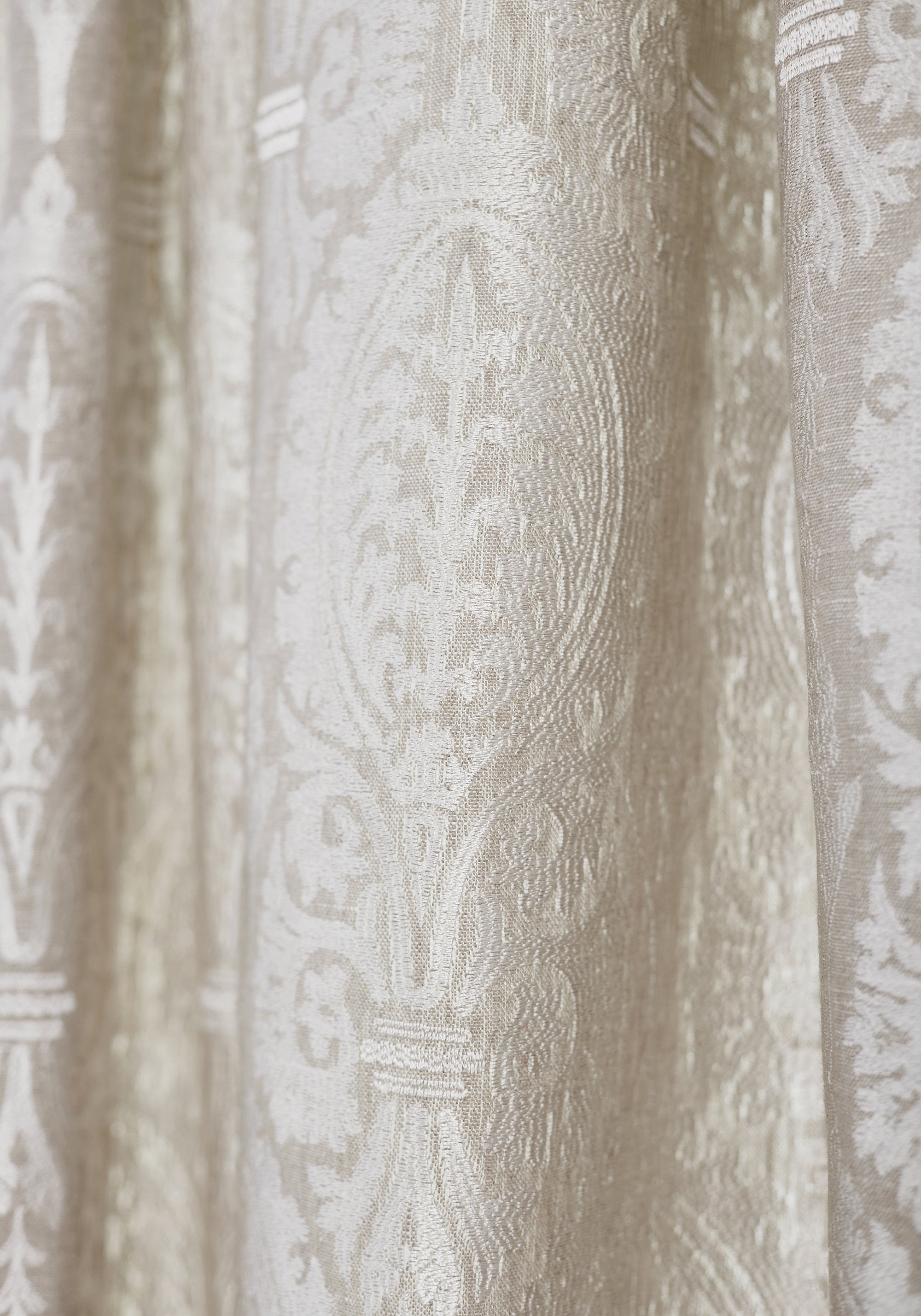 Detailed view of Sir Thomas Embroidery woven fabric in flax color variant by Thibaut in the Chestnut Hill collection - pattern number W772569