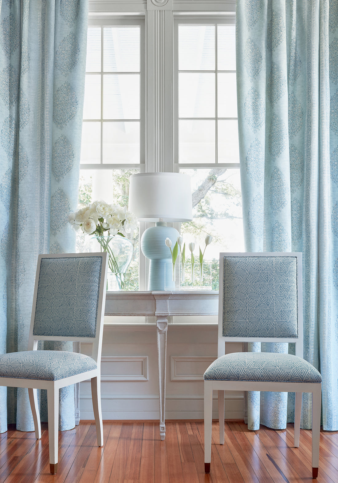 Lauderdale chairs in Mombasa printed fabric in slate blue color - pattern number F910207 by Thibaut in the Colony collection