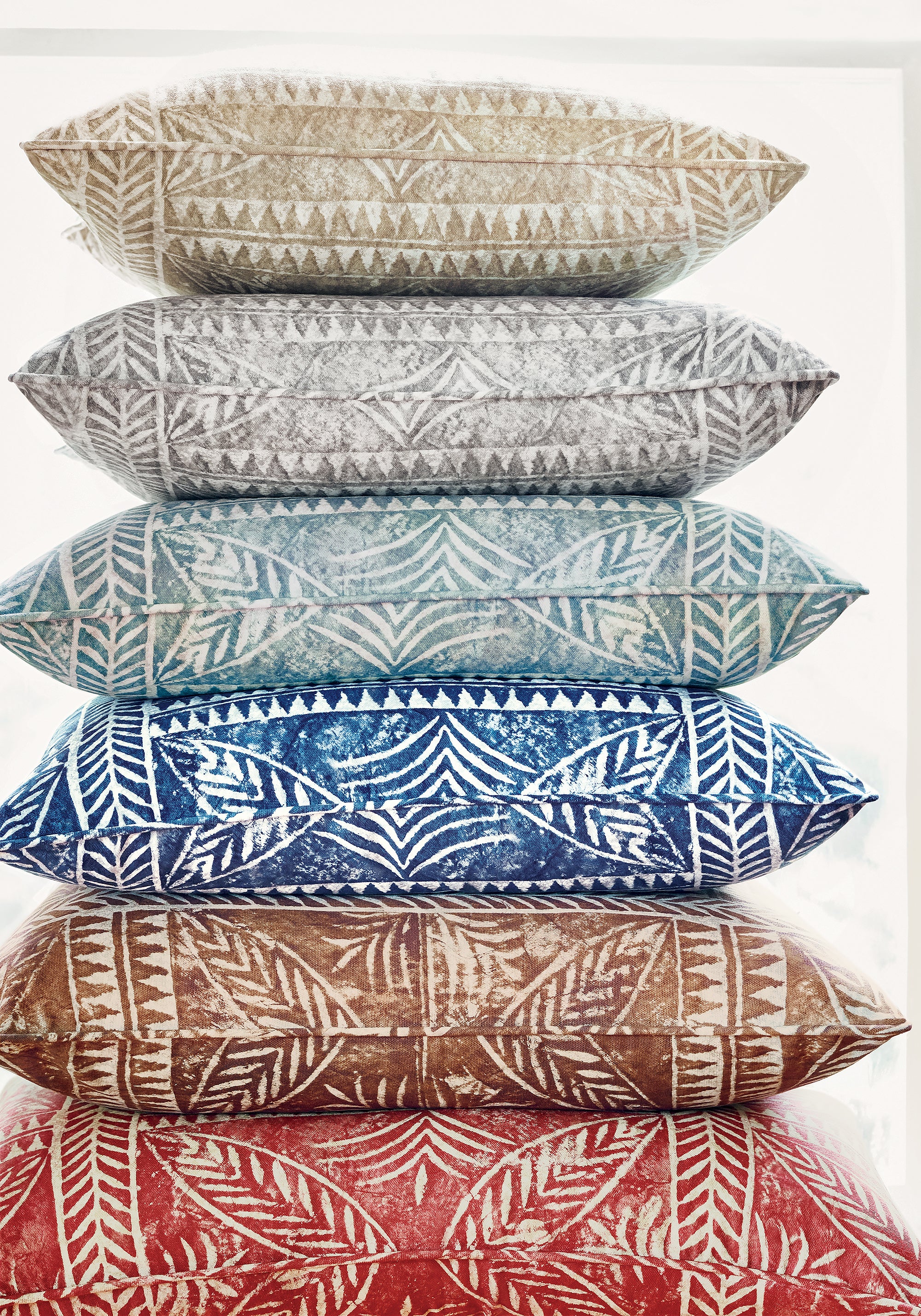 Collection of pillows in Timbuktu printed fabric in beige color fabric - pattern number F910256 - by Thibaut in the Colony collection