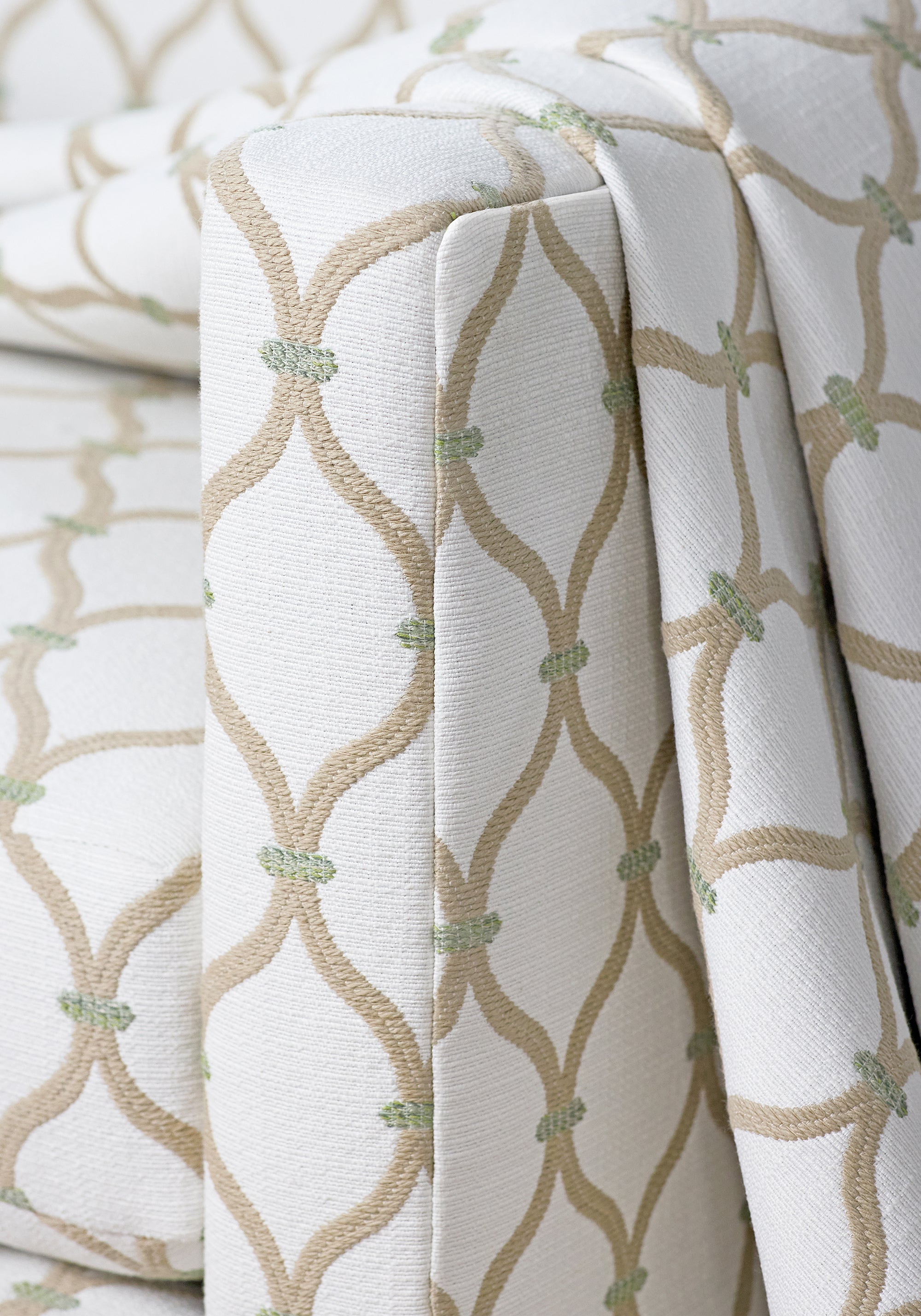 Detailed view of Carson chair with skirt in Chandler woven fabric in flax color variant by Anna French in the Bristol collection - pattern number W81934