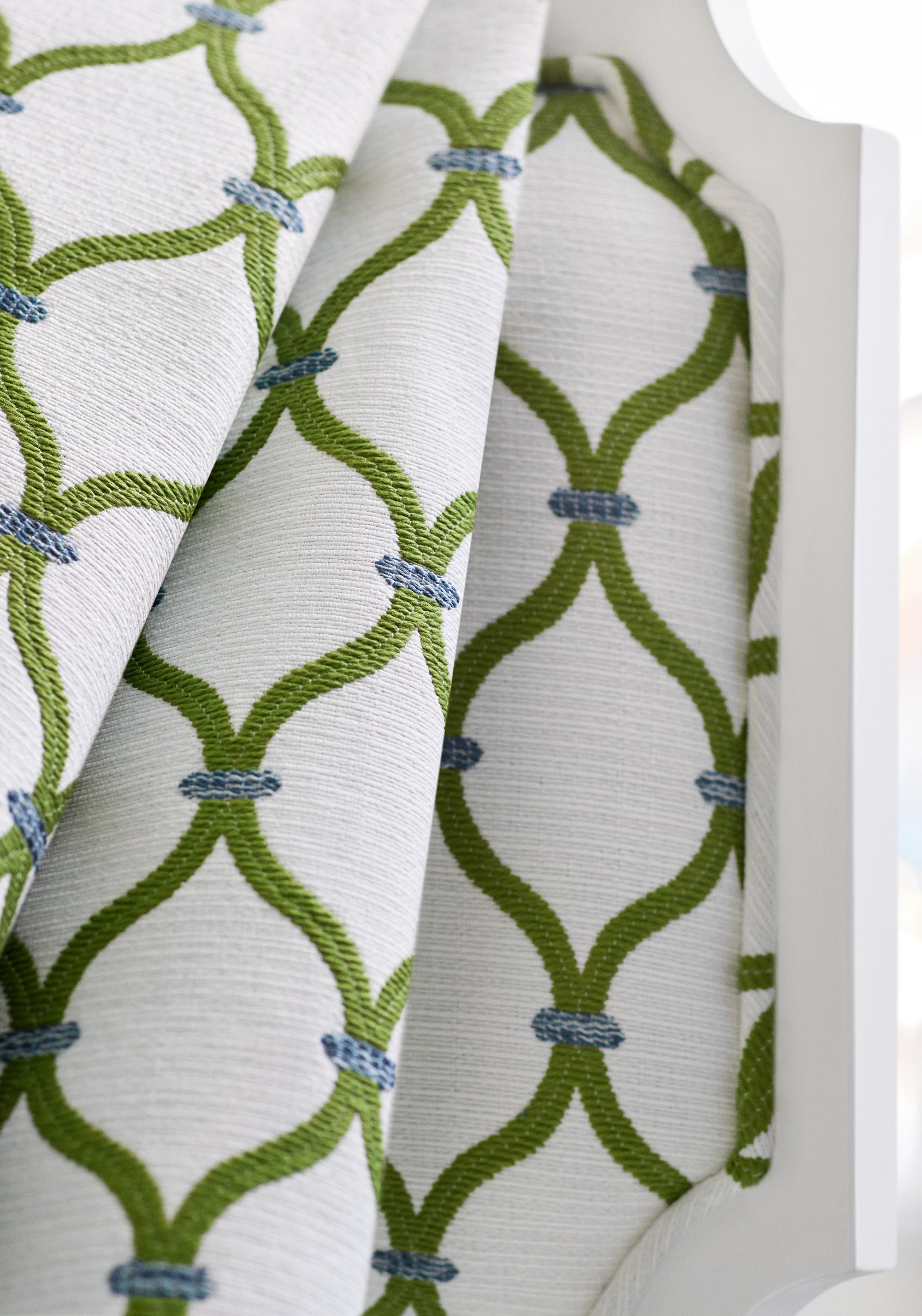Detailed view of Kelby Dining Chair in Chandler woven fabric in leaf color variant by Anna French in the Bristol collection - pattern number W81936