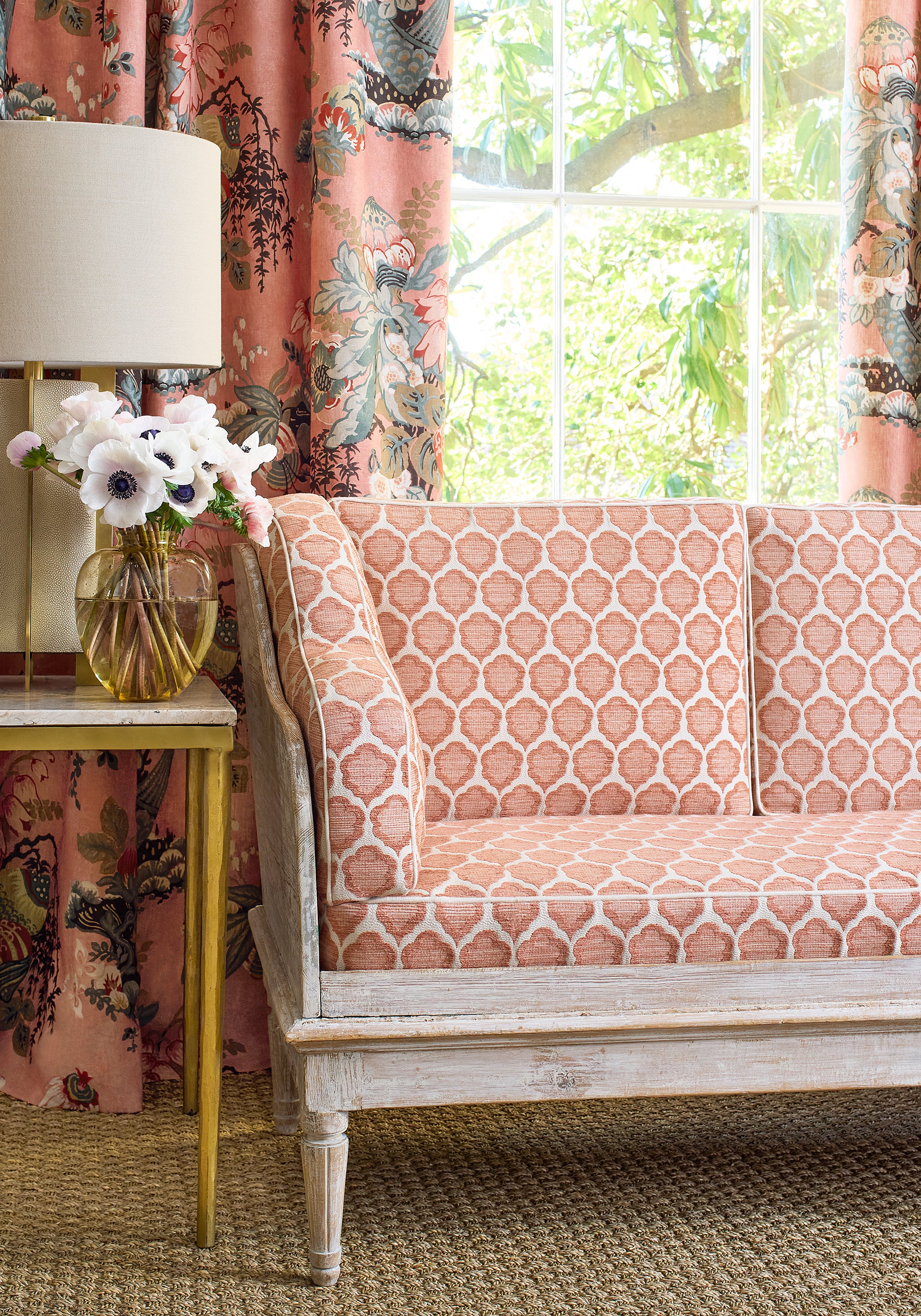 Detailed view of cushions in Genie woven fabric in terracotta color variant by Anna French in the Bristol collection - pattern number W81929