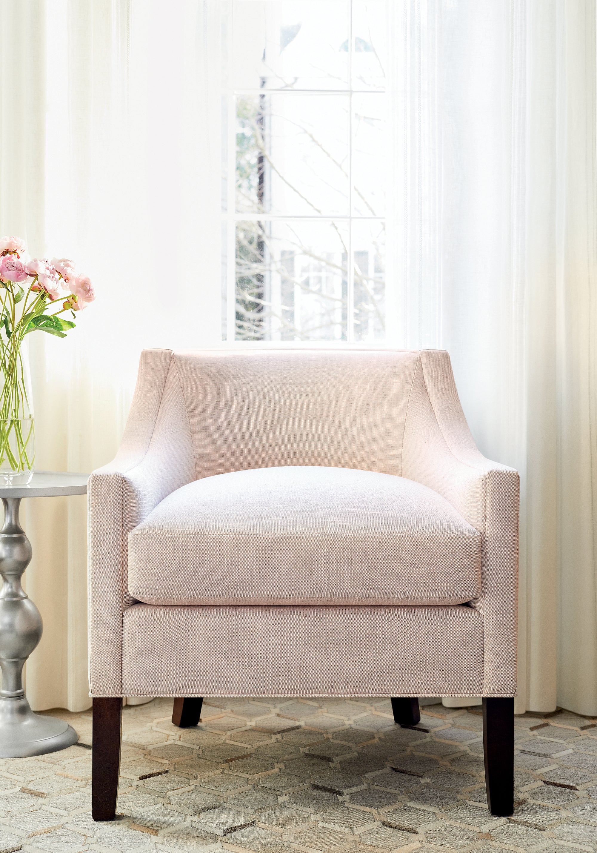 Living room with curtains made from Thibaut Bromley Stripe sheer woven fabric in Snow White