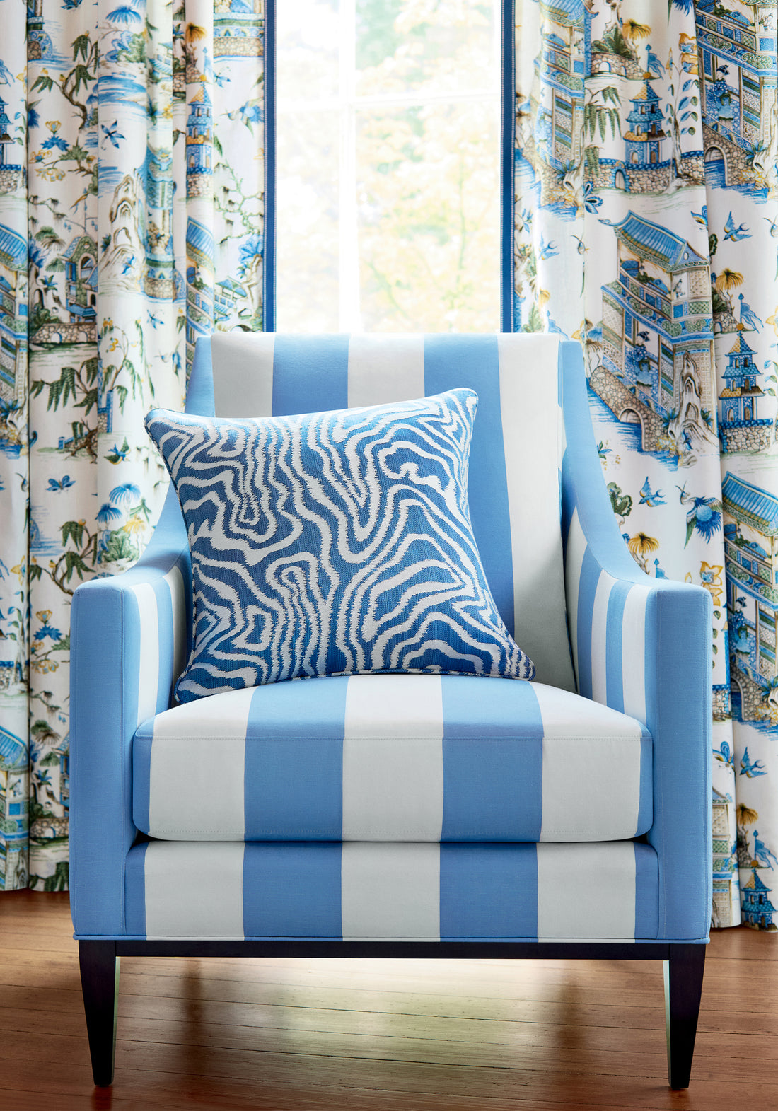 Living room chair upholstered in Thibaut Bergamo Stripe fabric in stripe blue pattern W713638