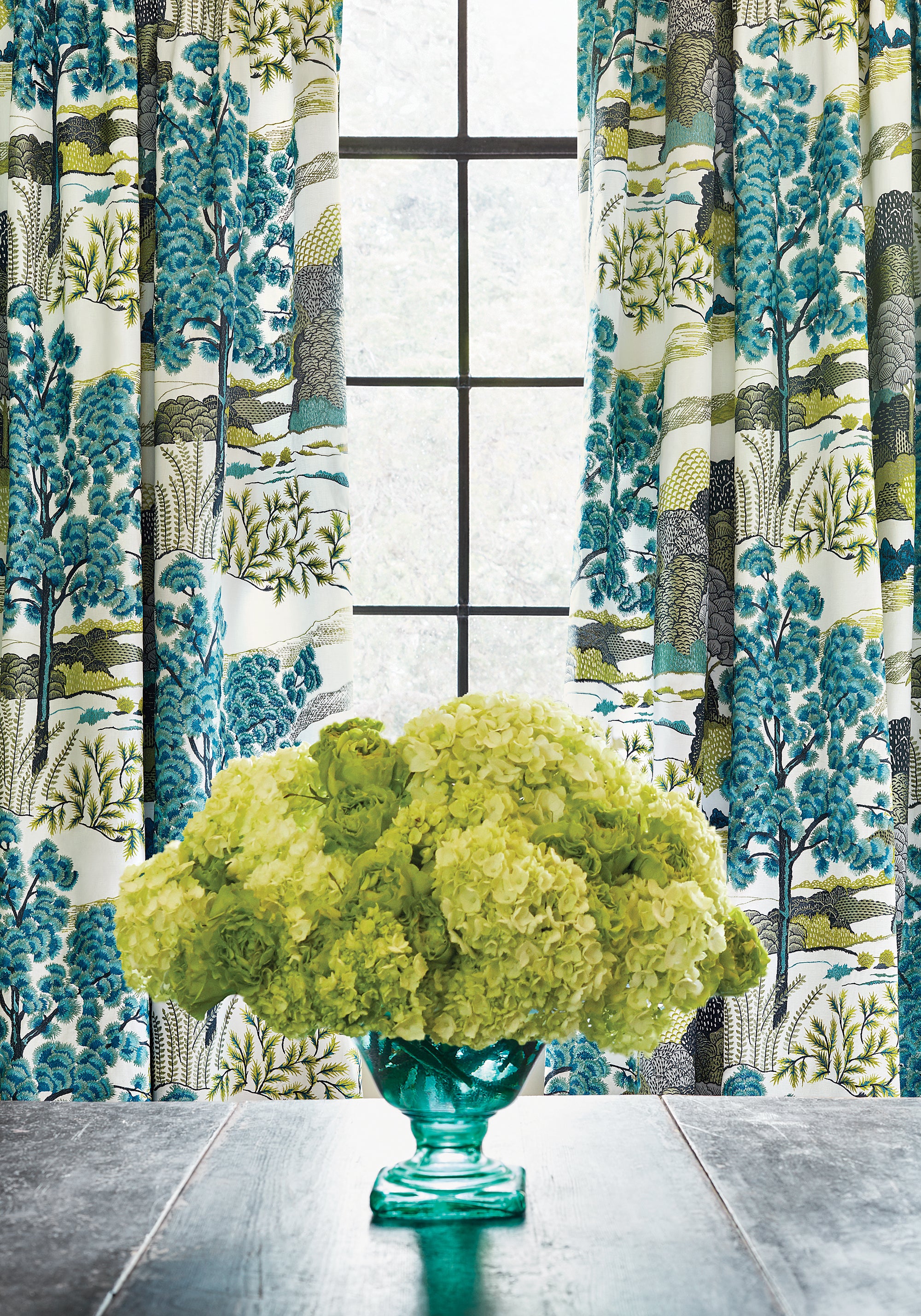 Dining room view of Daintree Embroidery fabric in bluemoon color - pattern number W785000 - by Thibaut in the Greenwood collection
