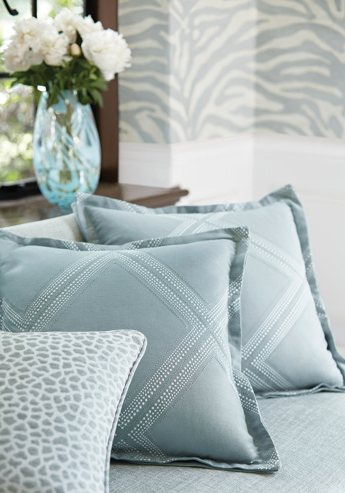 Pillows featuring Diamond Head Embroidery fabric in aqua color - pattern number W785014 - by Thibaut in the Greenwood collection