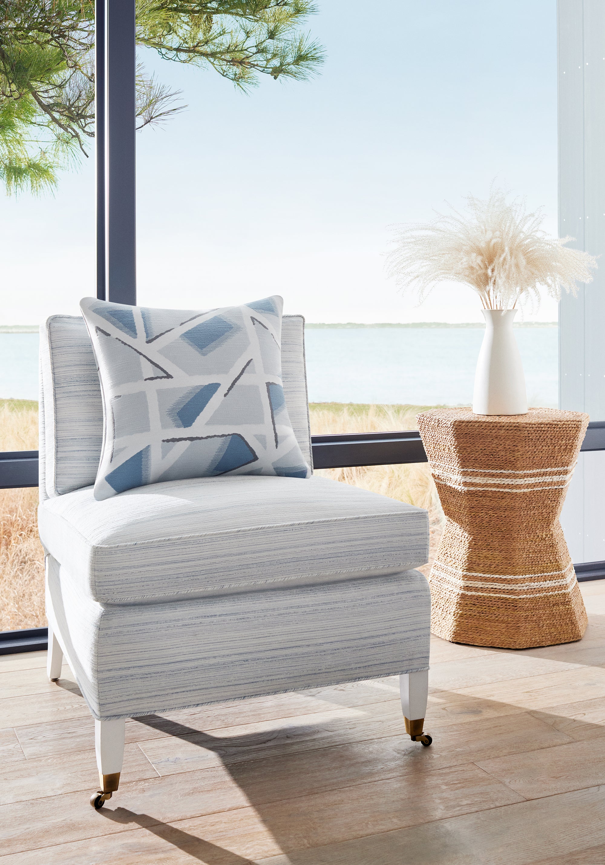 Pillow featuring Hazen fabric in heron color - pattern number W8834 - by Thibaut in the Haven collection