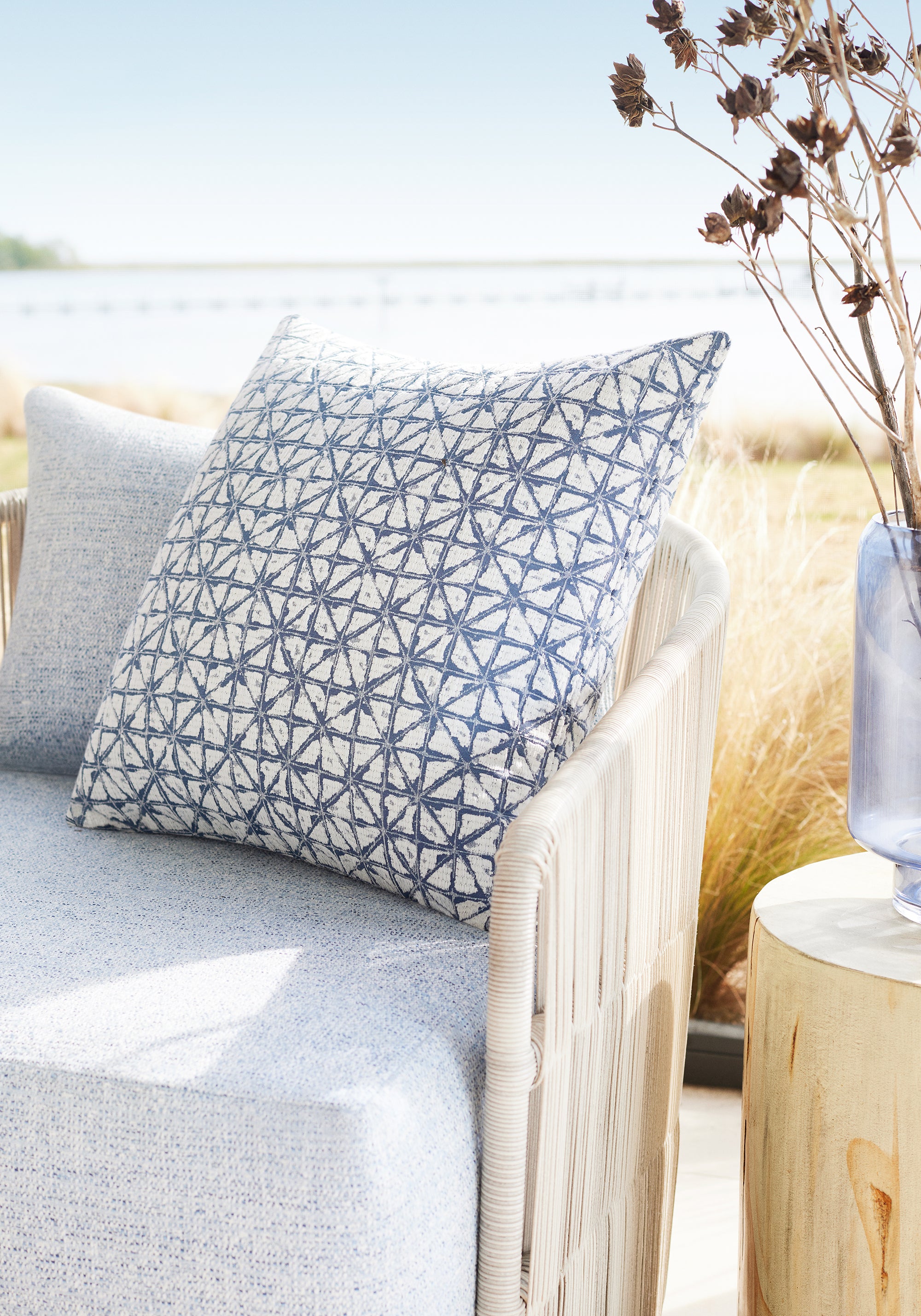 Close view of Chair cushion featuring Calais fabric in sky color - pattern number W8801 - by Thibaut in the Haven Textures collection