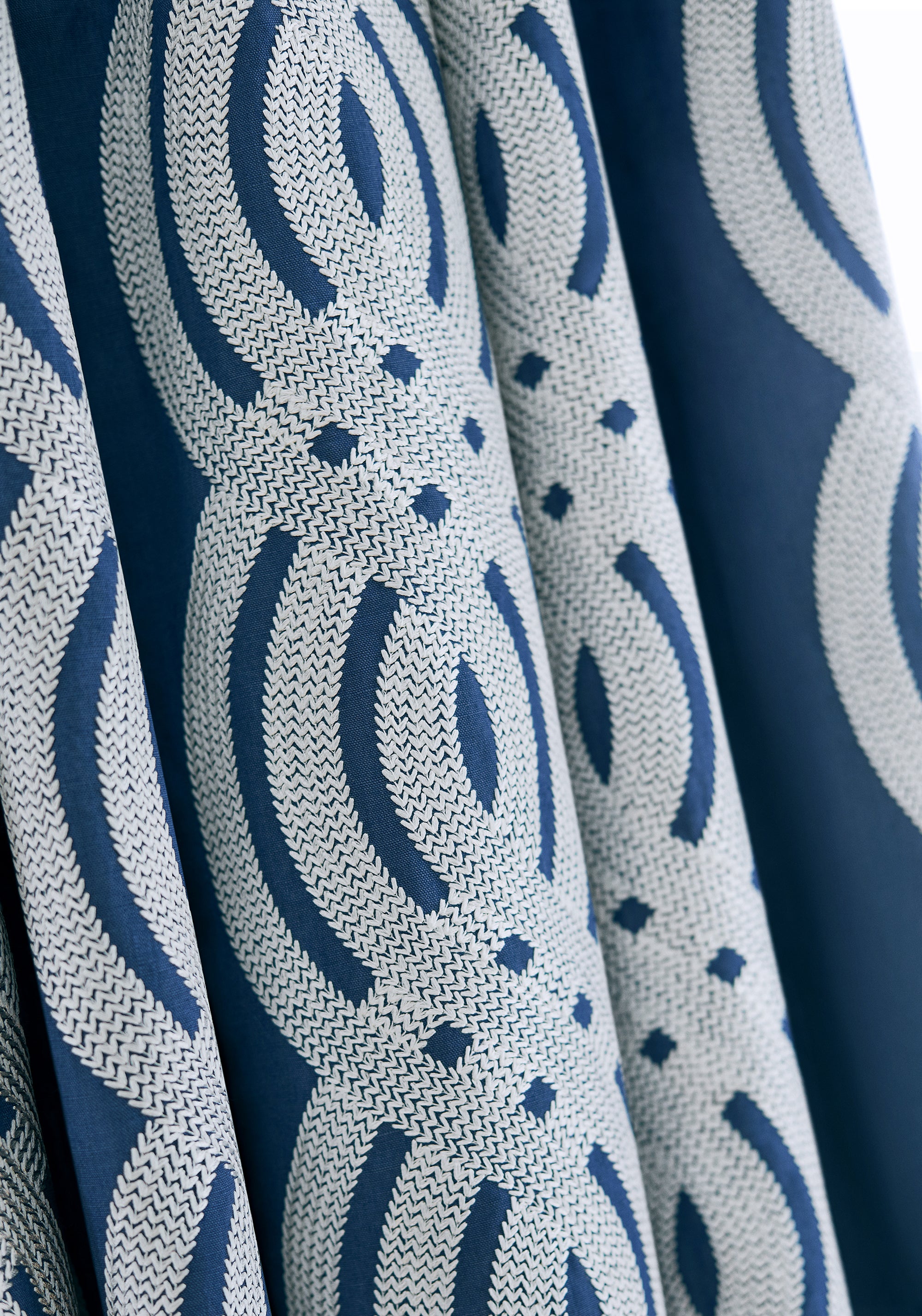 Detailed view of Braid Embroidery woven fabric in navy color variant by Thibaut in the Heritage collection - pattern number W710802
