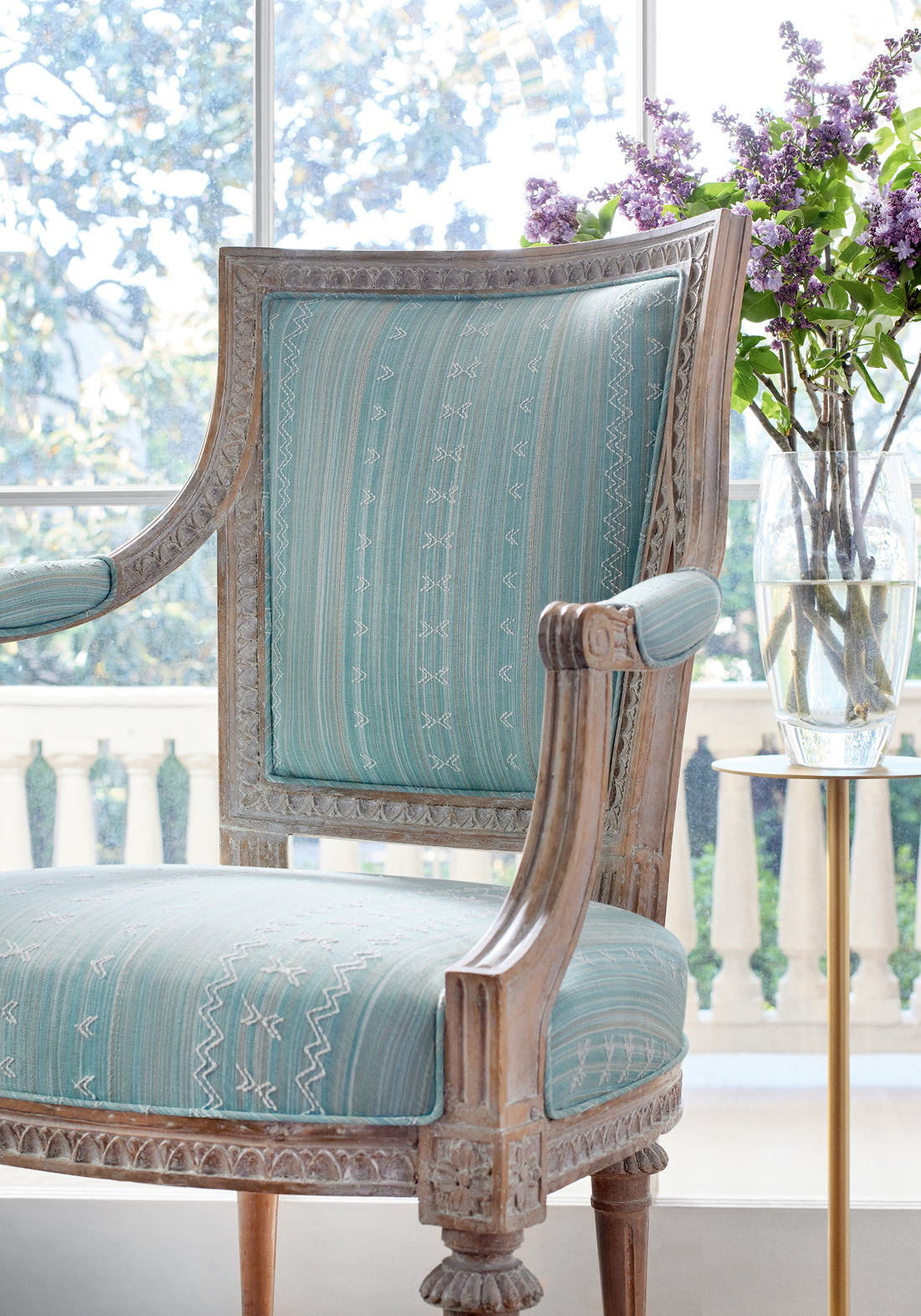 Dining chair featuring Charter Stripe Embroidery fabric in seaglass color - pattern number W736455 - by Thibaut in the Indienne collection