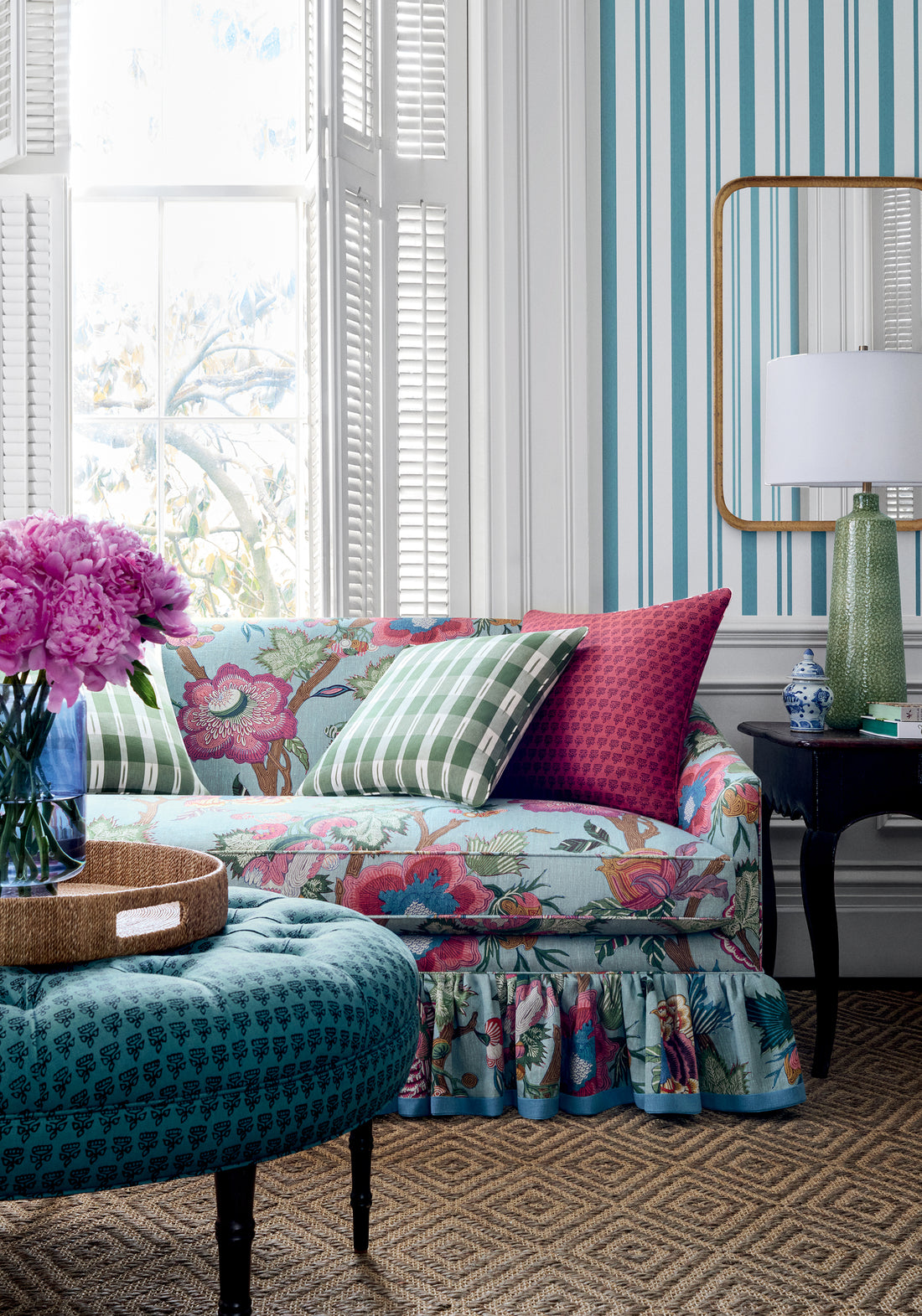 Couch featuring Indienne Jacobean fabric in raspberry and teal color - pattern number F936415 - by Thibaut in the Indienne collection