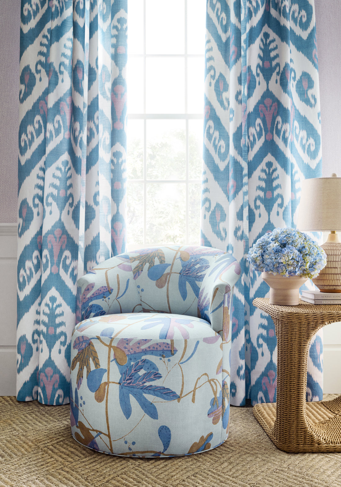 Draperies made from Indies Ikat fabric in lavender and french blue color - pattern number F916249 - by Thibaut fabric in the Kismet collection