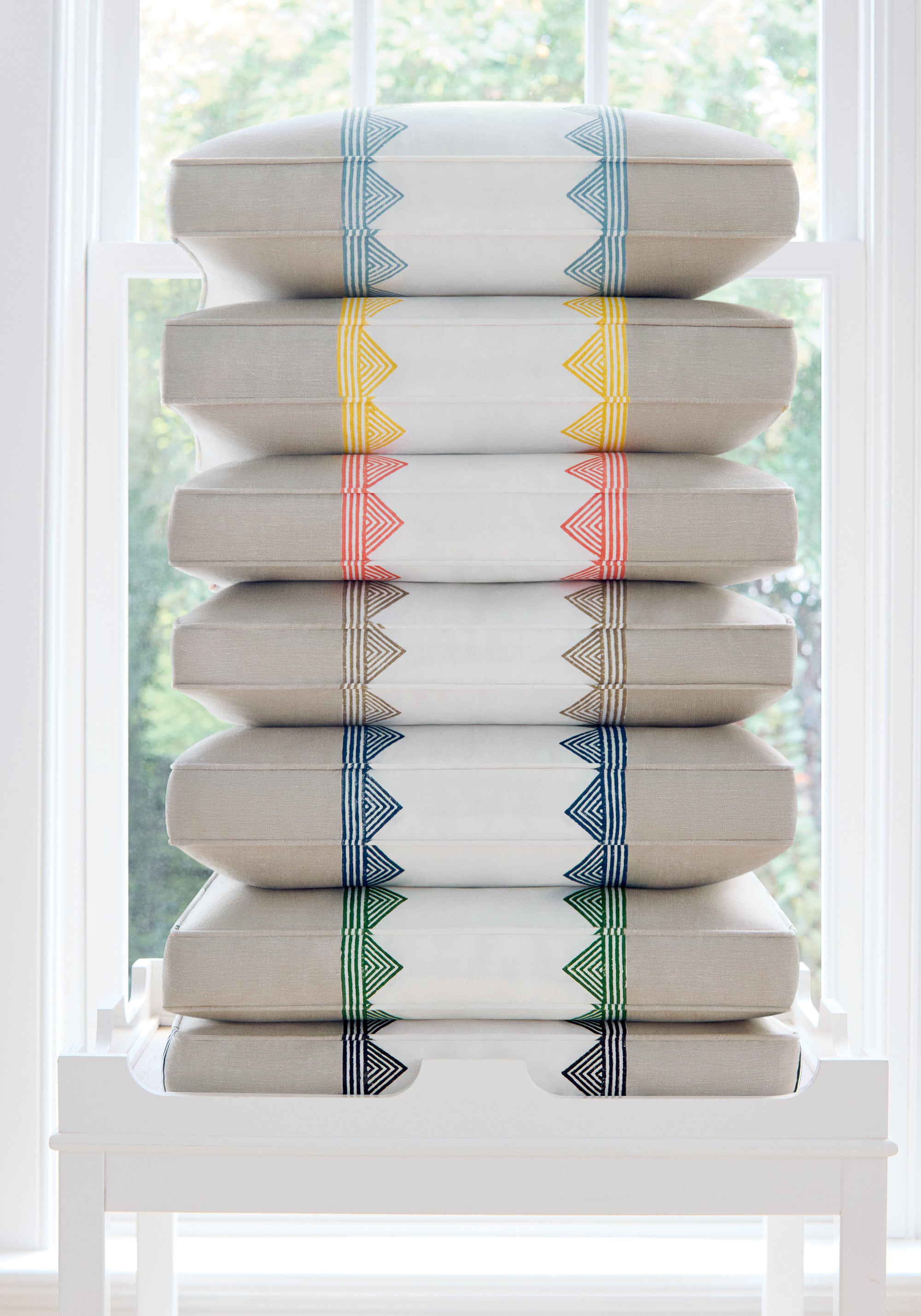 Color series showing pillow made from Kismet Stripe fabric in black color - pattern number F916232 - by Thibaut fabrics