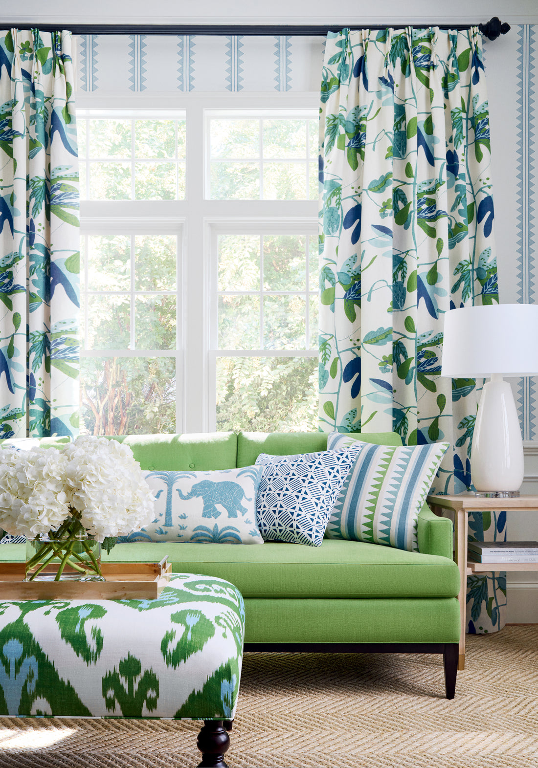 Draperies in Matisse Leaf printed fabric Green and Blue by Thibaut