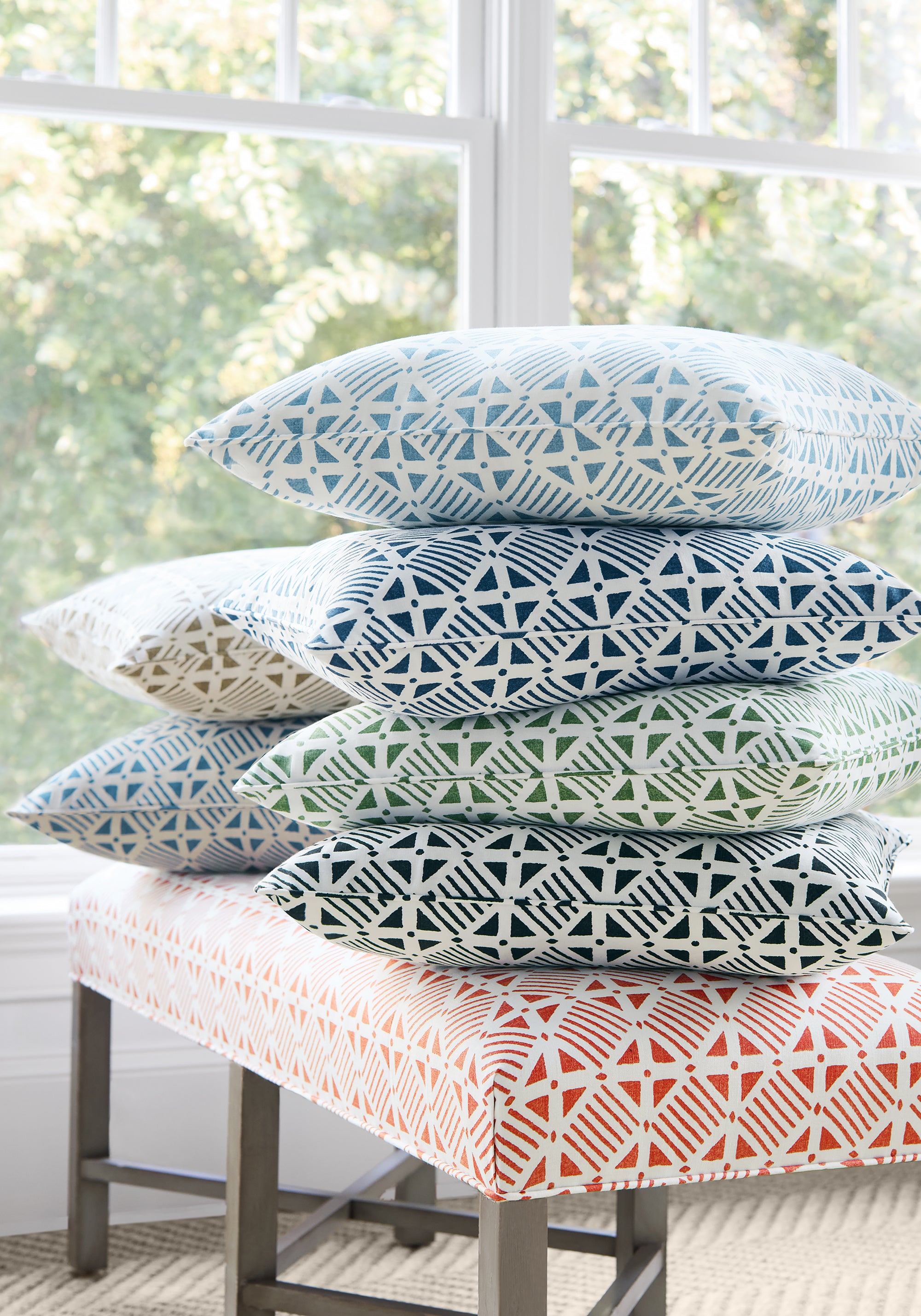 Color series showing pillow made from Plaza fabric in navy color - pattern number F916221 - by Thibaut fabrics