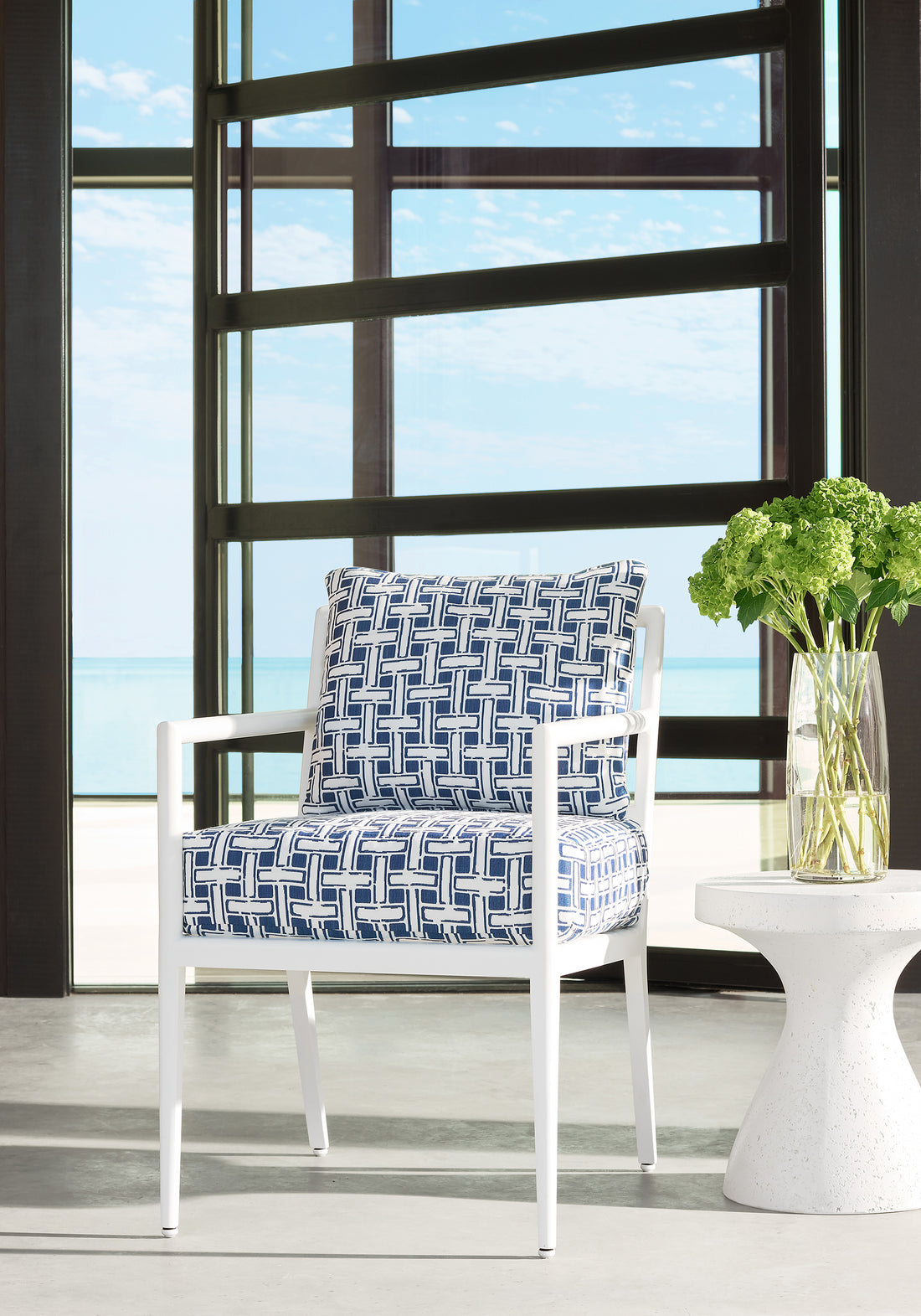 deCamp Dining Arm Chair from McKinnon and Harris in Panama Matelasse woven fabric in Navy by Thibaut