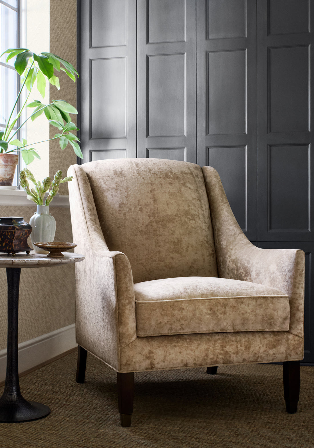 Wing chair with sunlight  in Celeste Velvet fabric in camel color - pattern number W8968 - by Thibaut in the Lyra Velvets collection