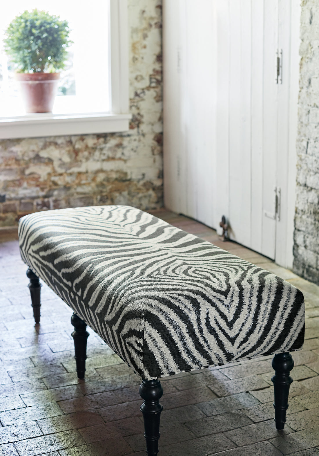 Baxter Ottoman in Zamira woven fabric in black color - pattern number W80438 - by Thibaut in the Woven Resource Vol 10 Menagerie collection