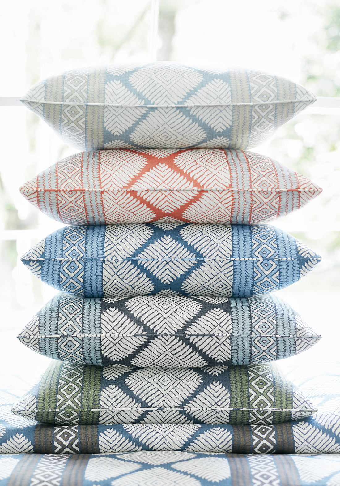 Collection of Austin printed fabric pillows featuring coral and spa blue color fabric - pattern number F913248 - by Thibaut in the Mesa collection