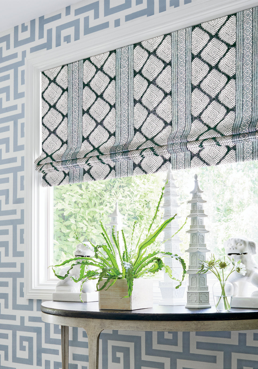 Roman shades in Austin printed fabric in black and mineral blue color - pattern number F913250 by Thibaut in the Mesa collection