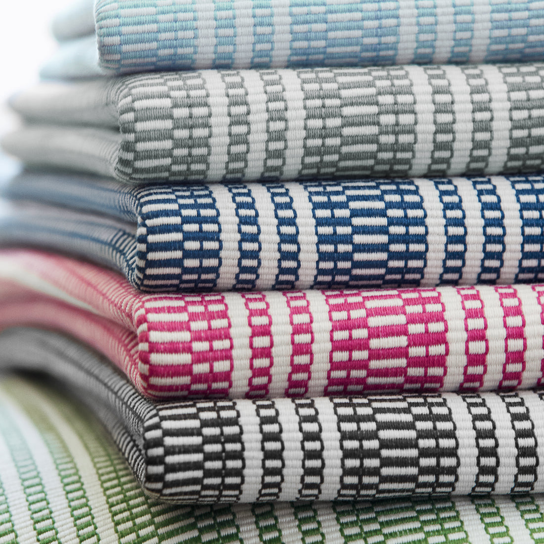 Fabric swatches showing Reed Stripe fabric in grey color - pattern number AW9846 - by Anna French in the Nara collection