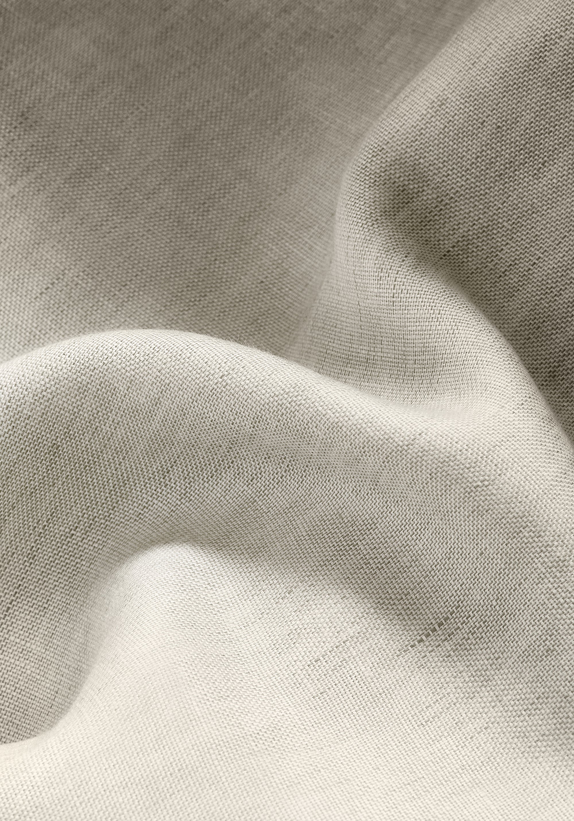 Detail of Skye Linen wide woven fabric in stone color by Thibaut as part of the Palisades collection - pattern number FWW7601