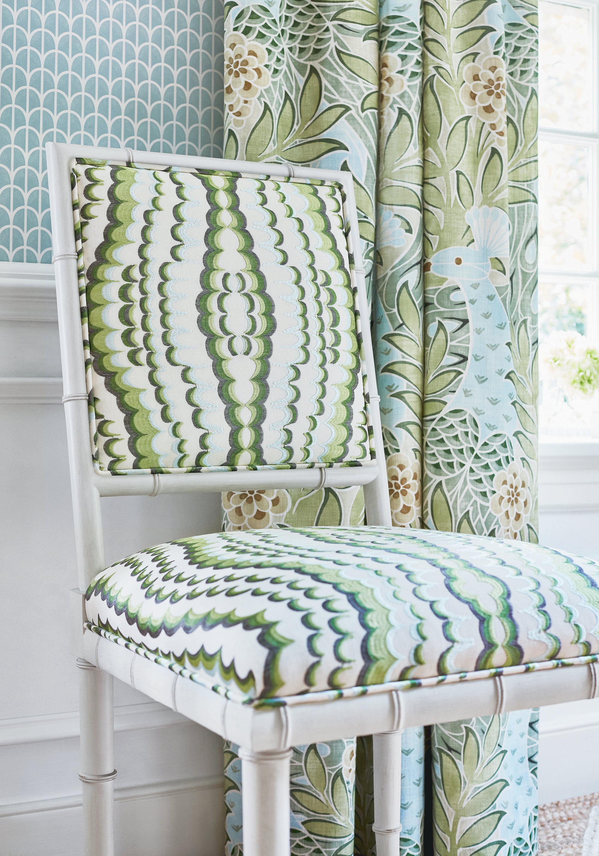 Detailed view of Darien Dining Chair in Ebru Embroidery woven fabric in green color variant by Thibaut in the Paramount collection - pattern number W72984
