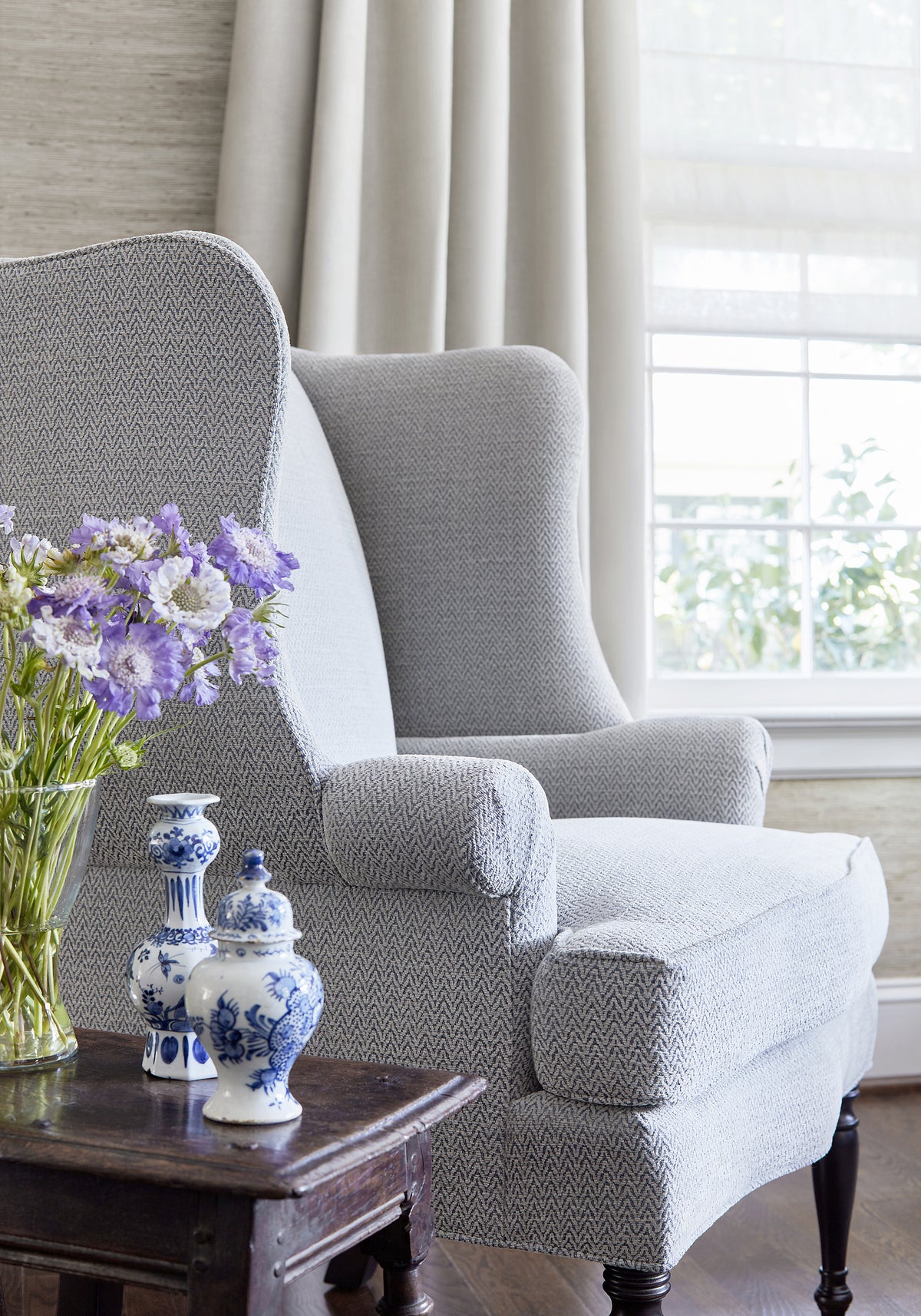 Detailed view of Dartmouth Wing Chair in Beatrix woven fabric in slate color variant by Thibaut in the Pinnacle collection - pattern number W80603
