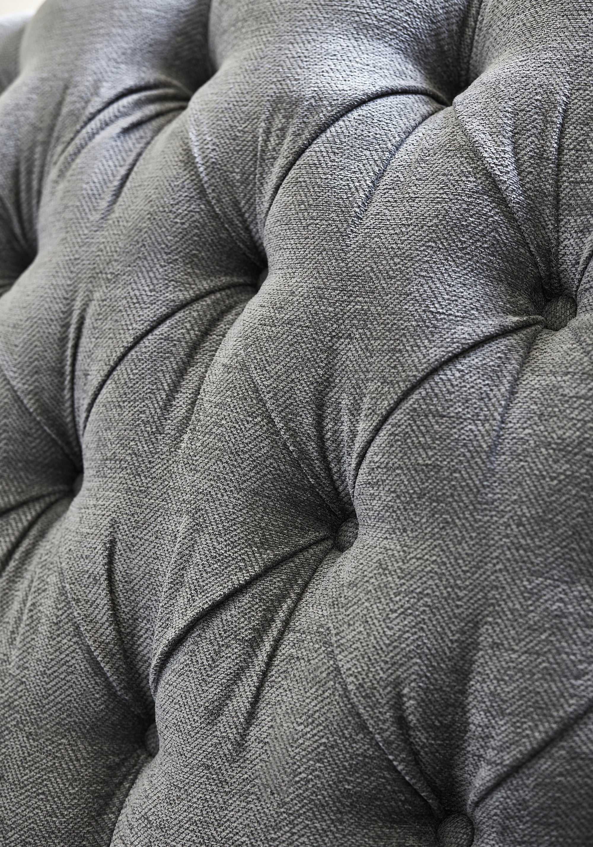 Detailed Bronwyn Herringbone woven fabric in charcoal color, pattern number W80685 of the Thibaut Pinnacle collection