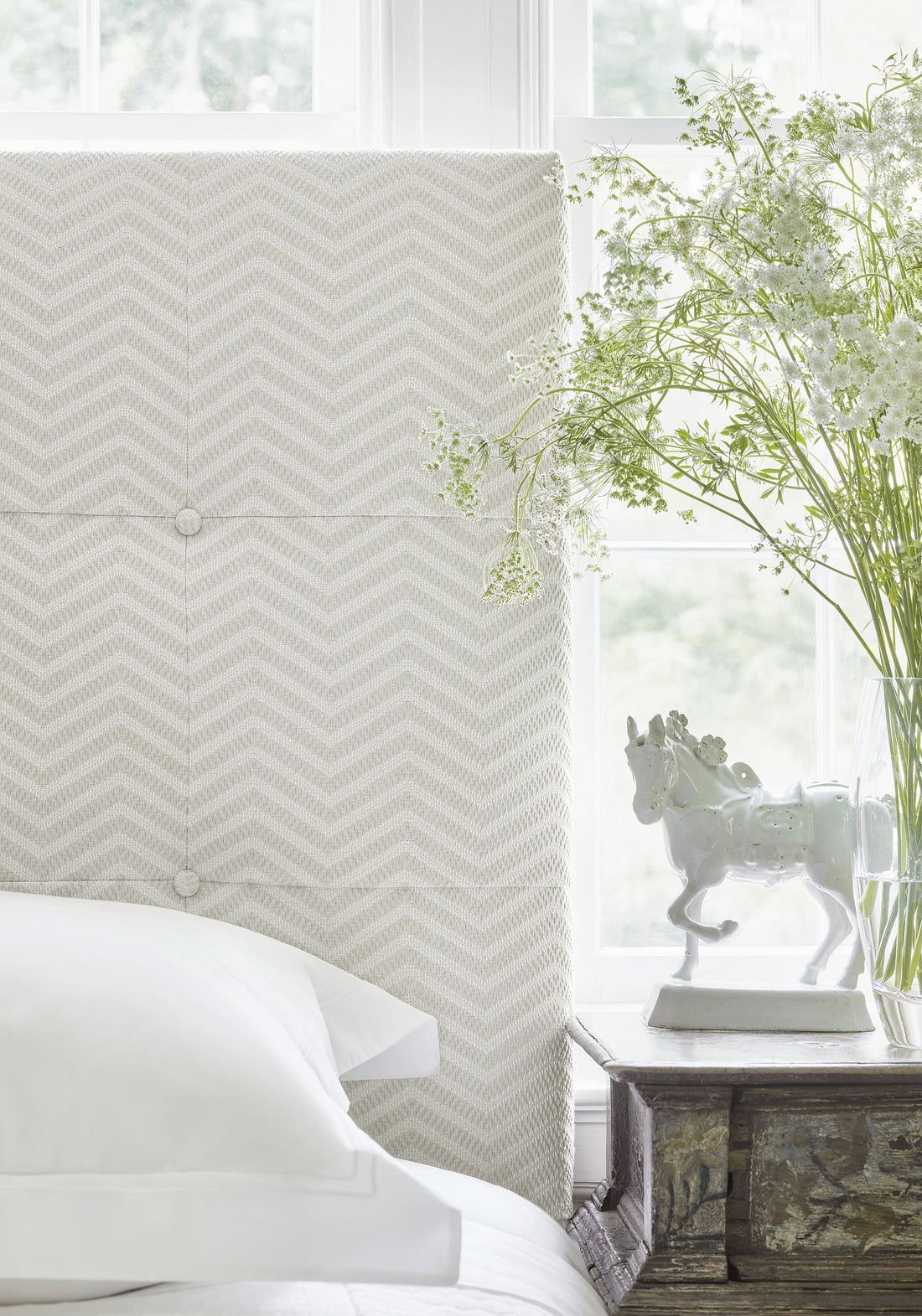 Detailed view of Sonoma Headboard in Matari Chevron woven fabric in almond color variant by Thibaut in the Pinnacle collection - pattern number W80631