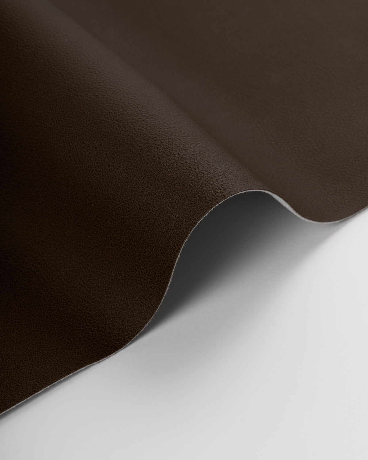 Reset fabric in Cacao color - pattern number RESET.66.0 - by Kravet Contract in the Evolve Faux Leather collection